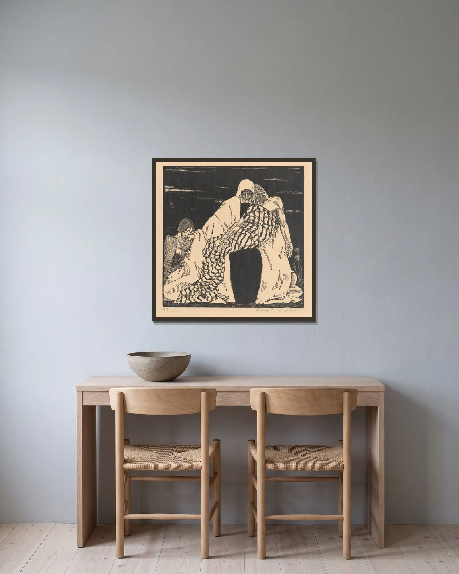 Pieta (Mater Dolorosa) av Wiktoria Goryńska inramad på en vägg