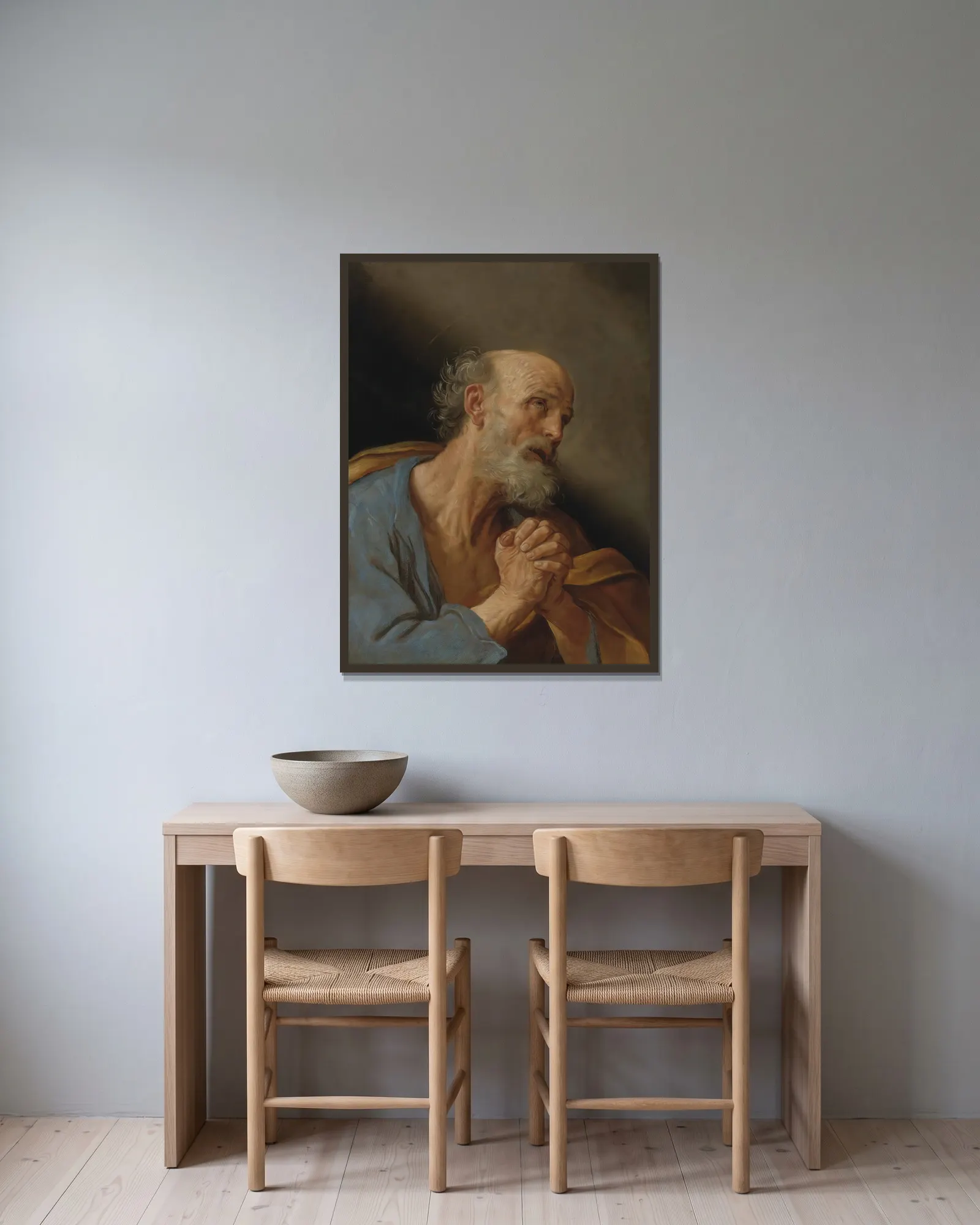 The Penitent Saint Peter av Guido Reni inramad på en vägg