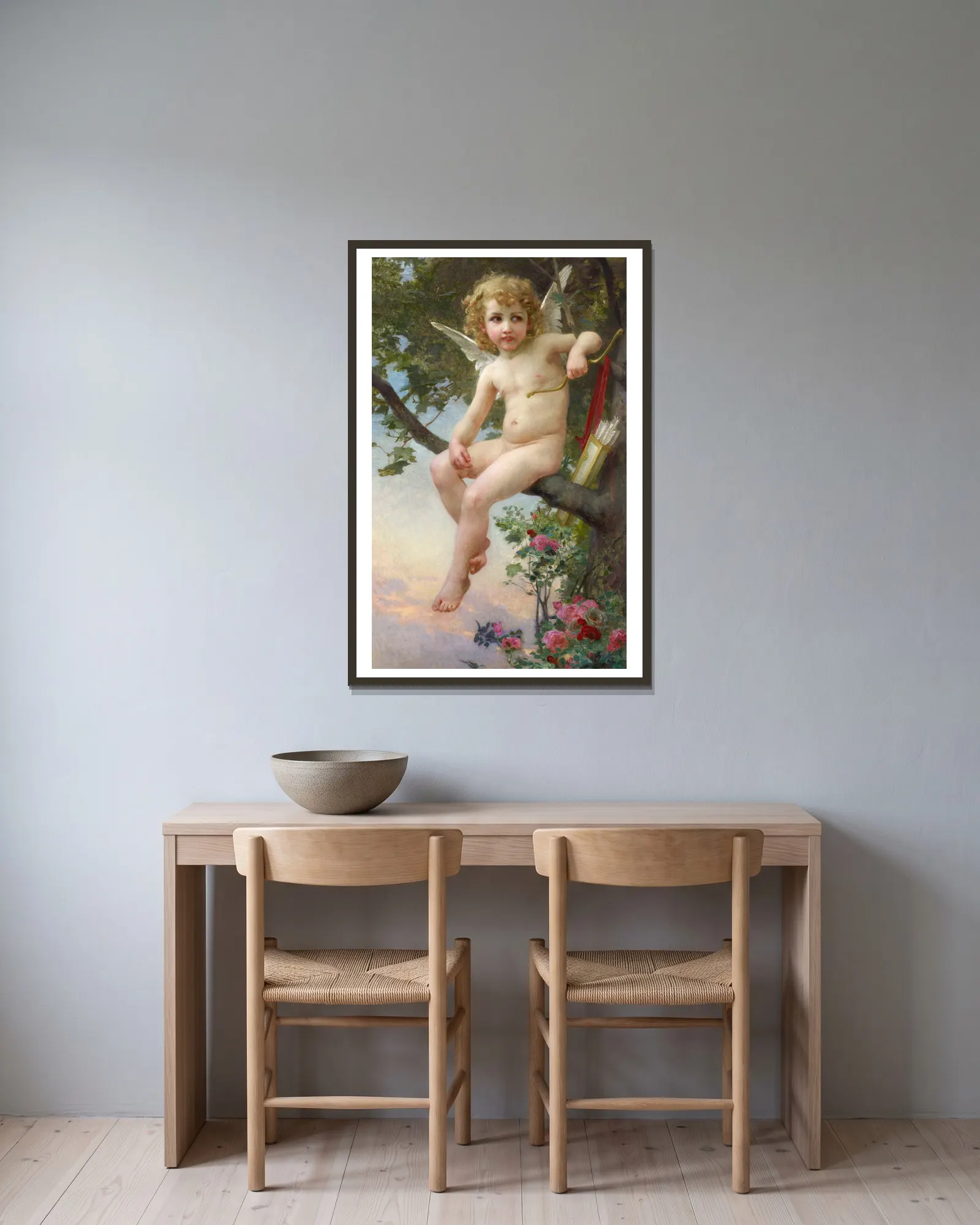 Cupid av Guillaume Seignac inramad på en vägg