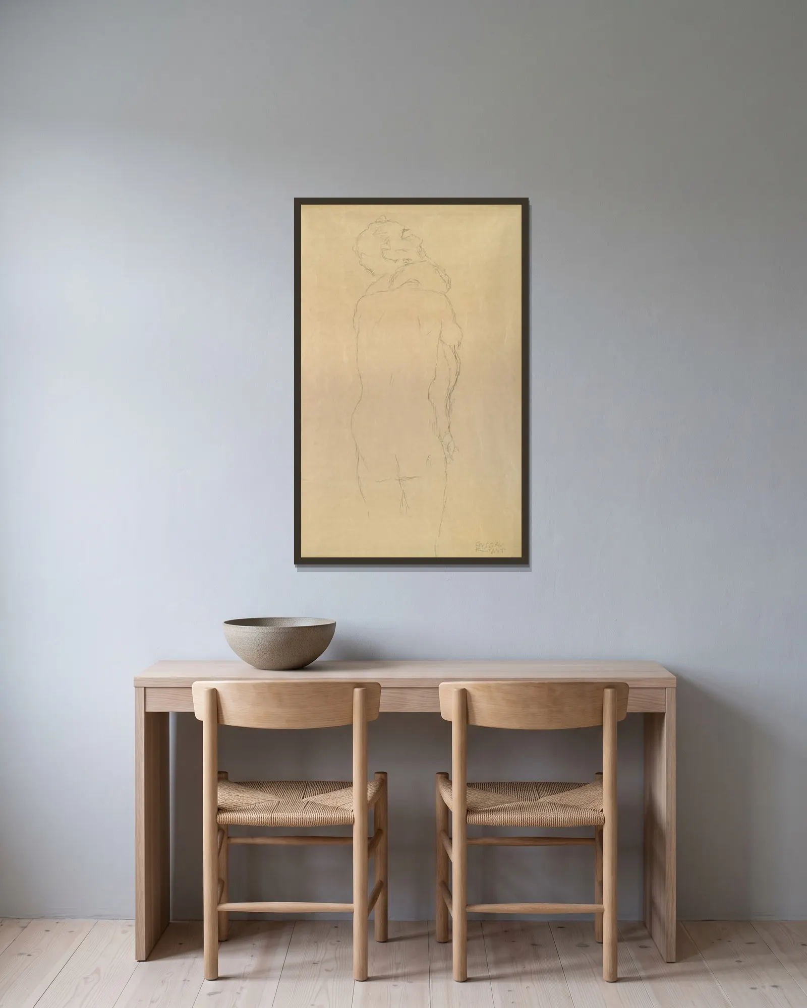 Adam und Eva Studie av Gustav Klimt inramad på en vägg
