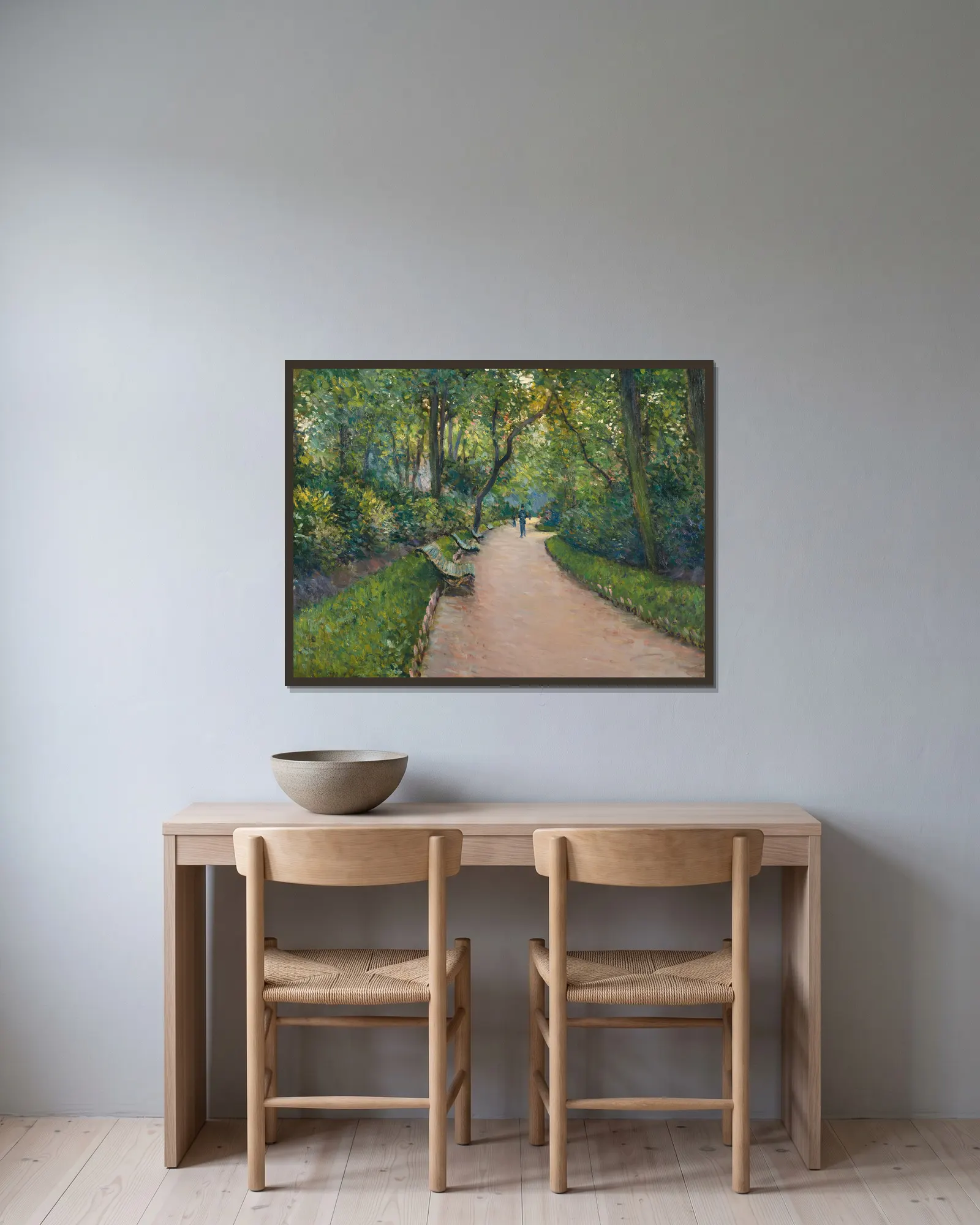 Le Parc Monceau av Gustave Caillebotte inramad på en vägg