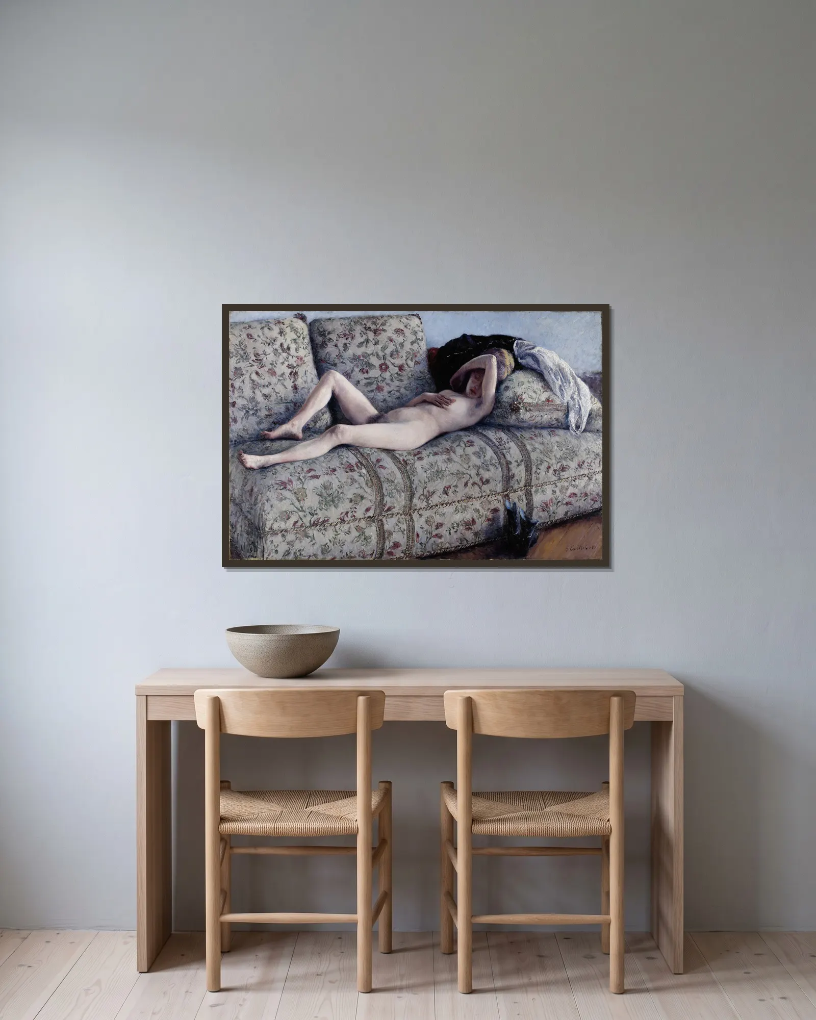 Nude on a Couch av Gustave Caillebotte inramad på en vägg