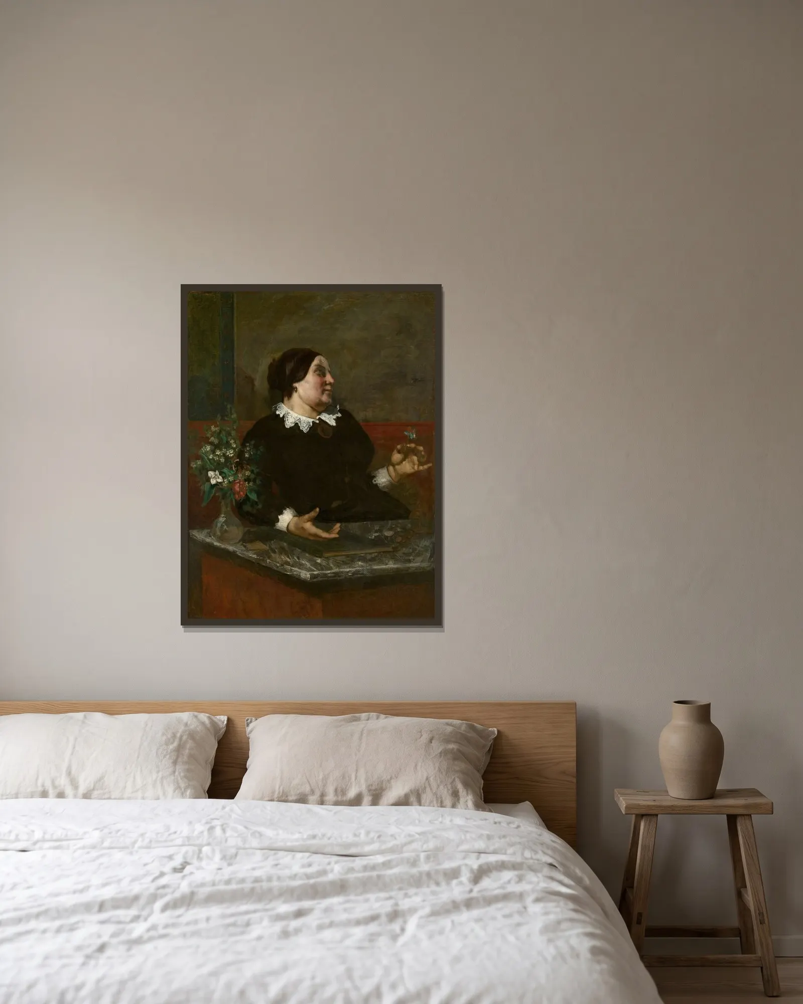 Mère Grégoire av Gustave Courbet inramad på en vägg