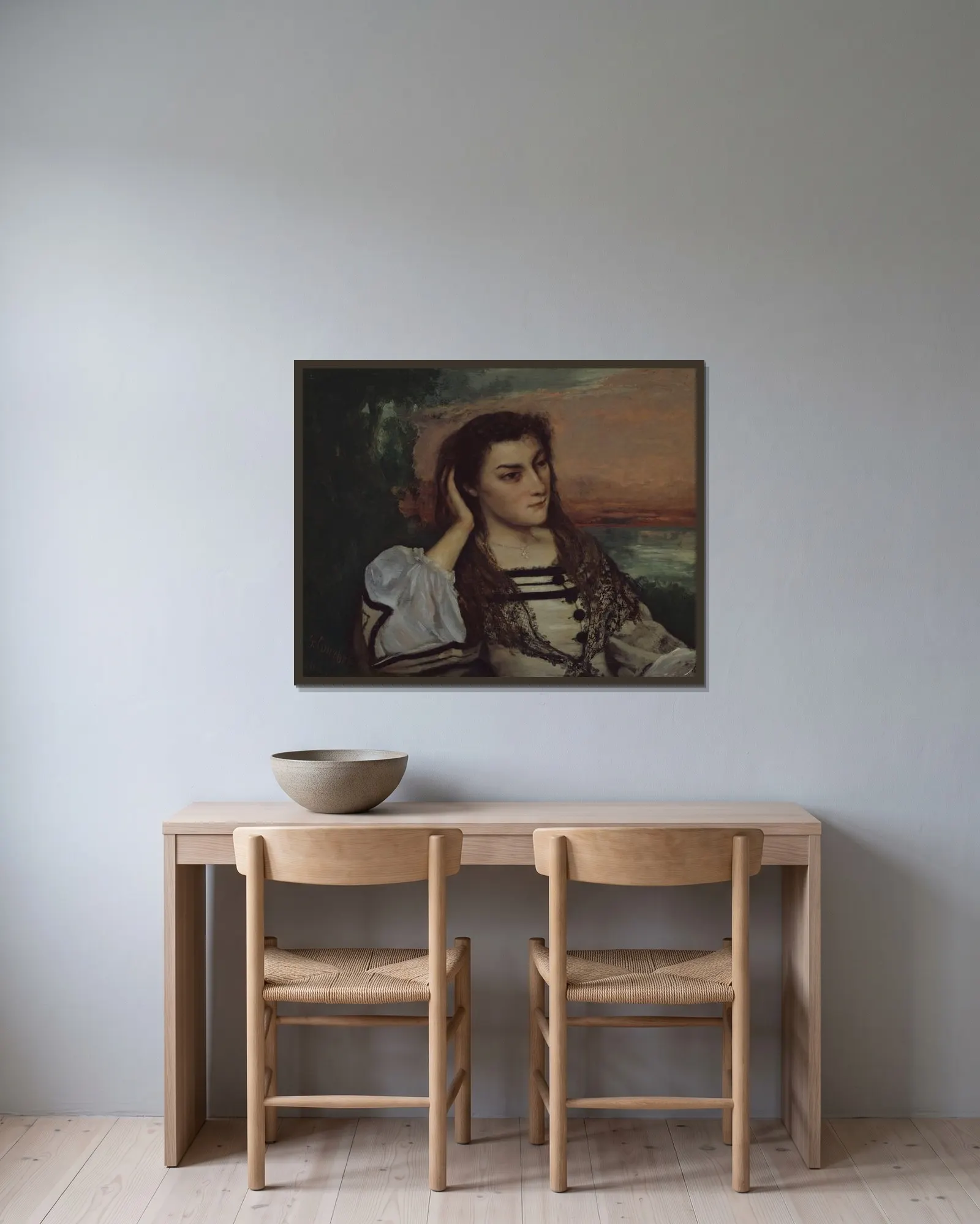 Reverie (Portrait of Gabrielle Borreau) av Gustave Courbet inramad på en vägg