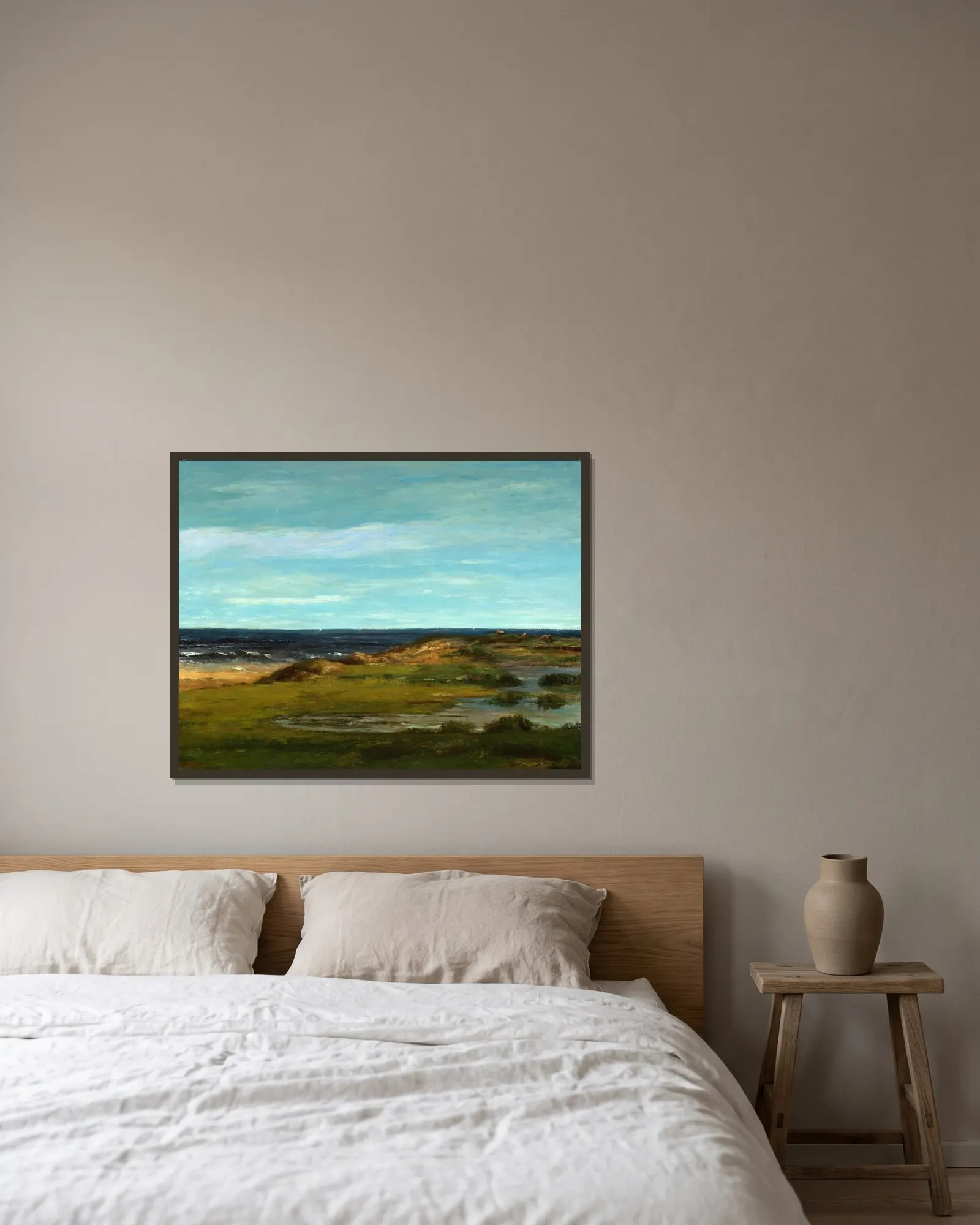 Seascape av Gustave Courbet inramad på en vägg