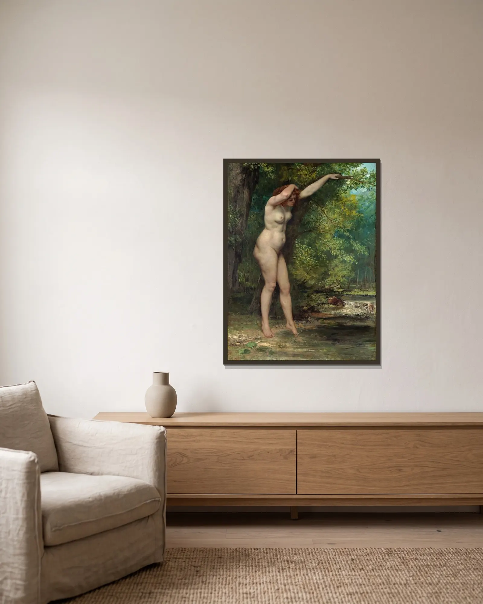 The Young Bather av Gustave Courbet inramad på en vägg