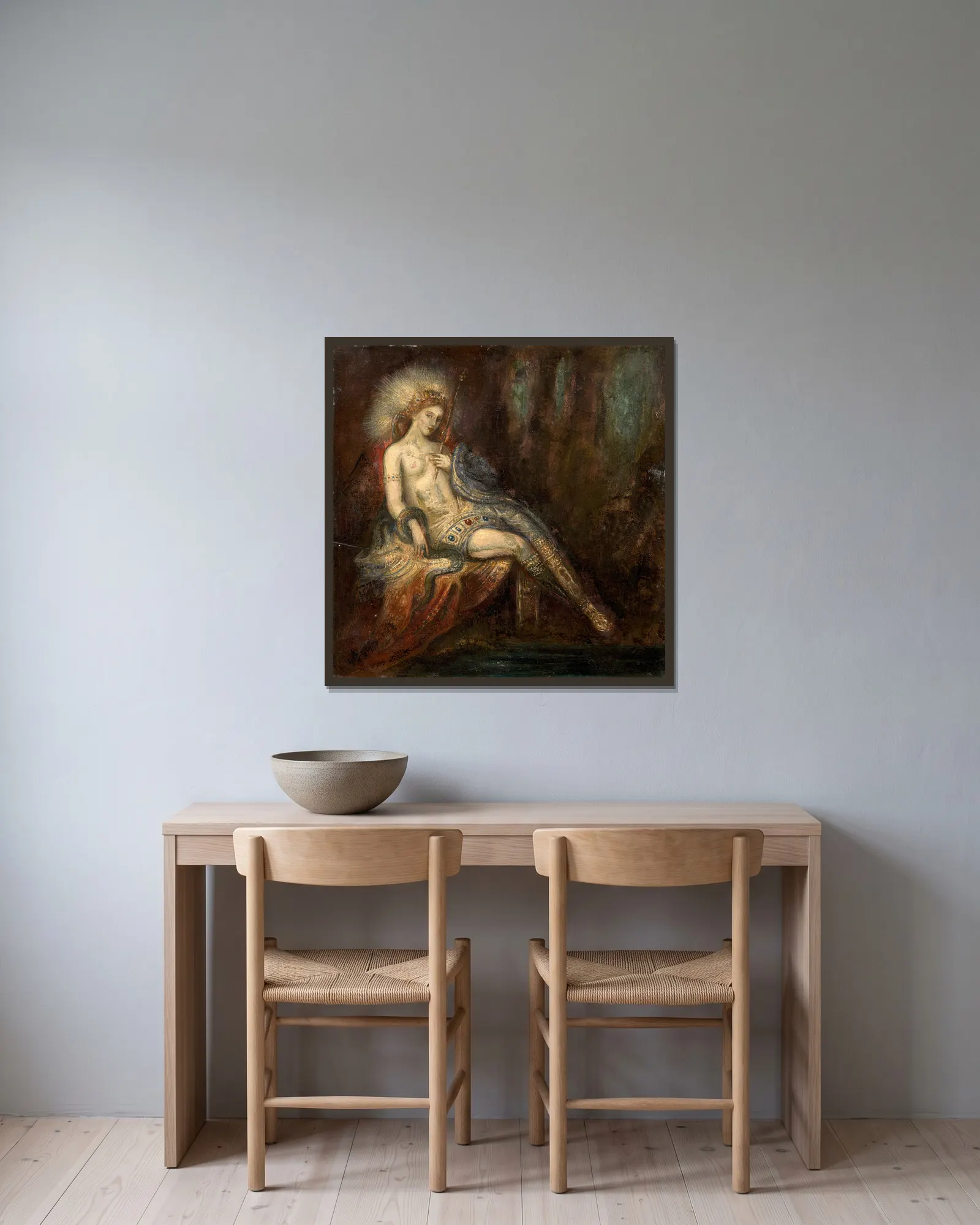 Déesse au rocher av Gustave Moreau inramad på en vägg