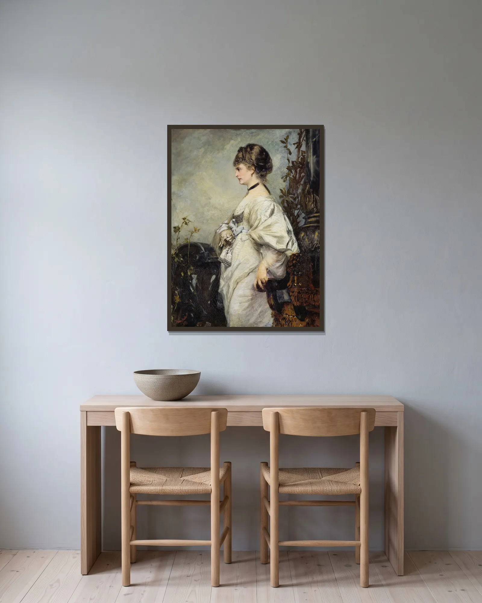 Magdalena Plach av Hans Makart inramad på en vägg