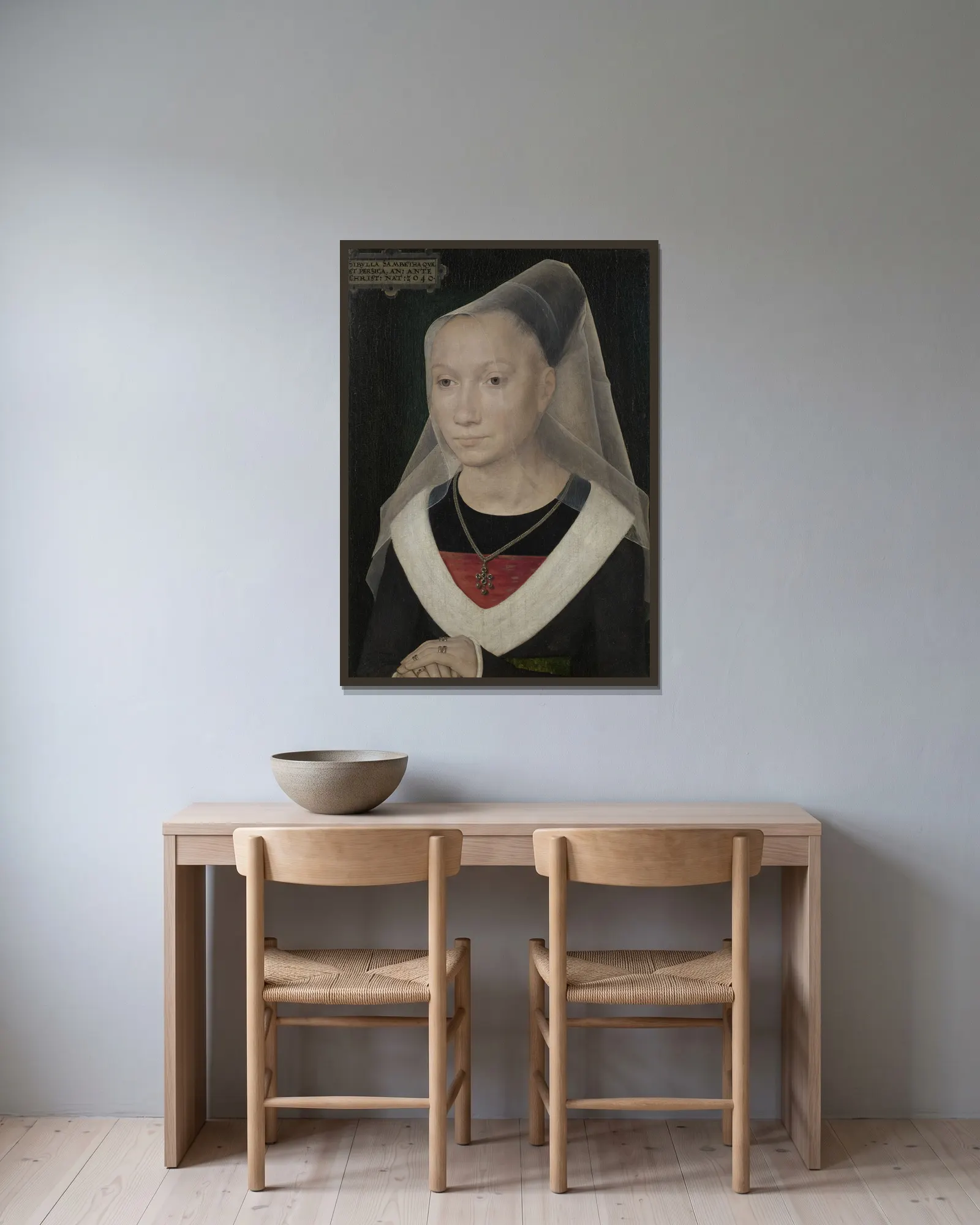 Sibylla Sambetha av Hans Memling inramad på en vägg