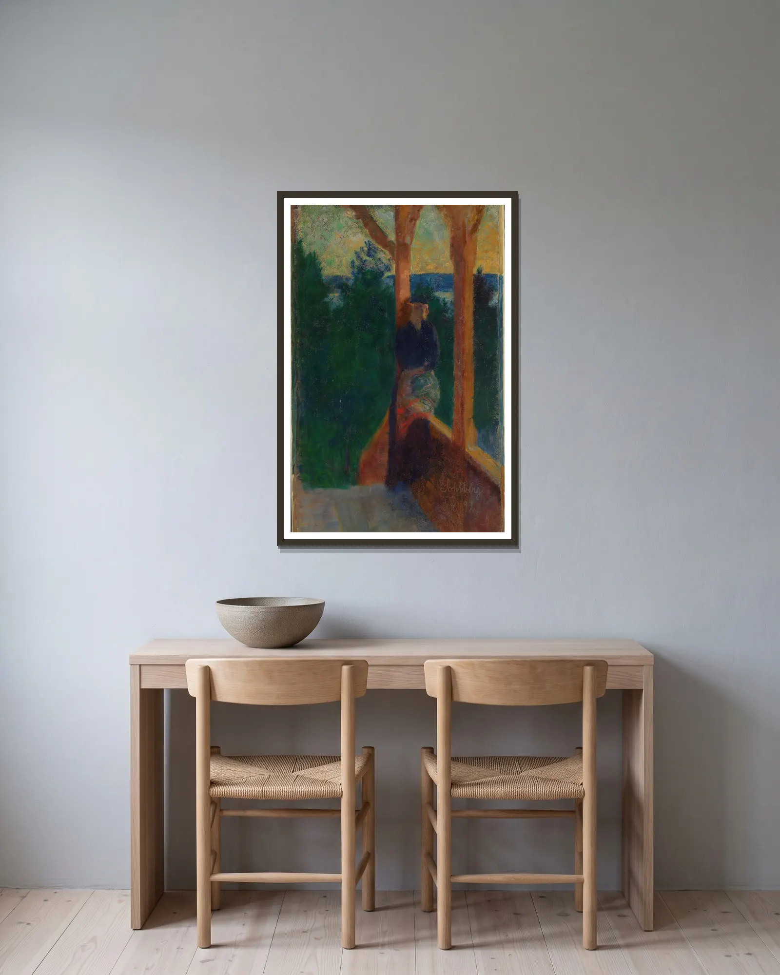 On the Veranda av Harald Sohlberg inramad på en vägg