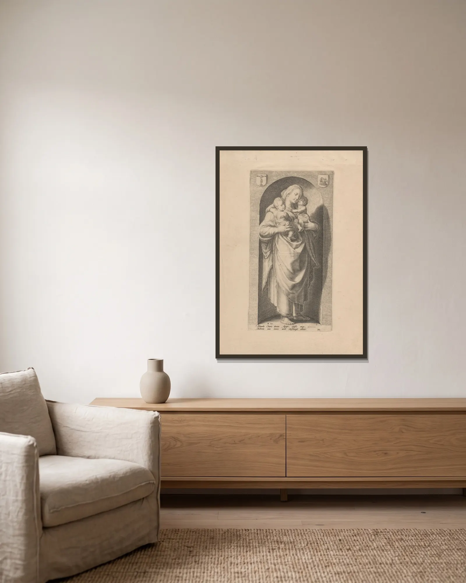 Charity av Hendrick Goltzius inramad på en vägg