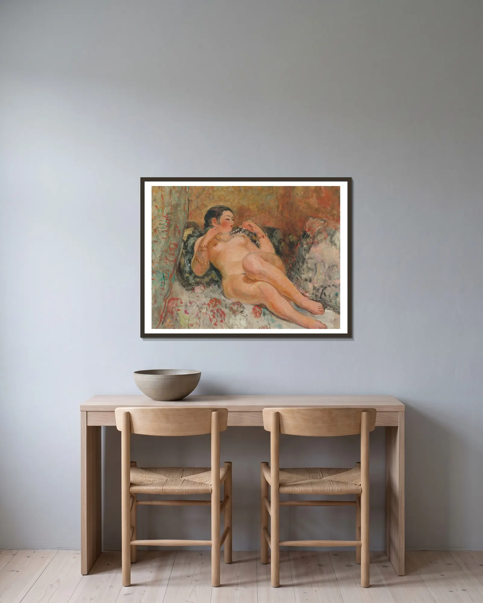 Nu Allongée av Henri Lebasque inramad på en vägg