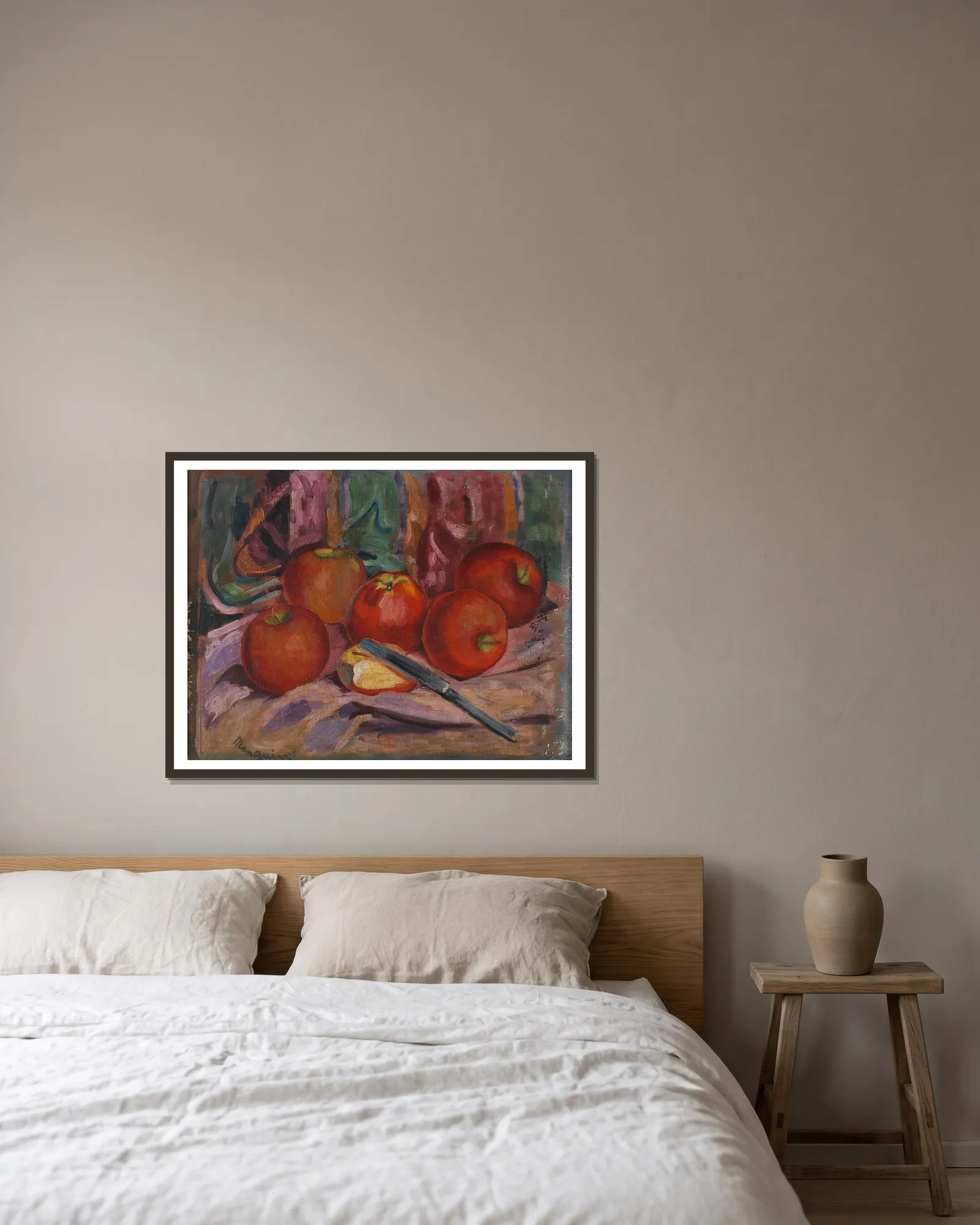 Apples av Henri Manguin inramad på en vägg