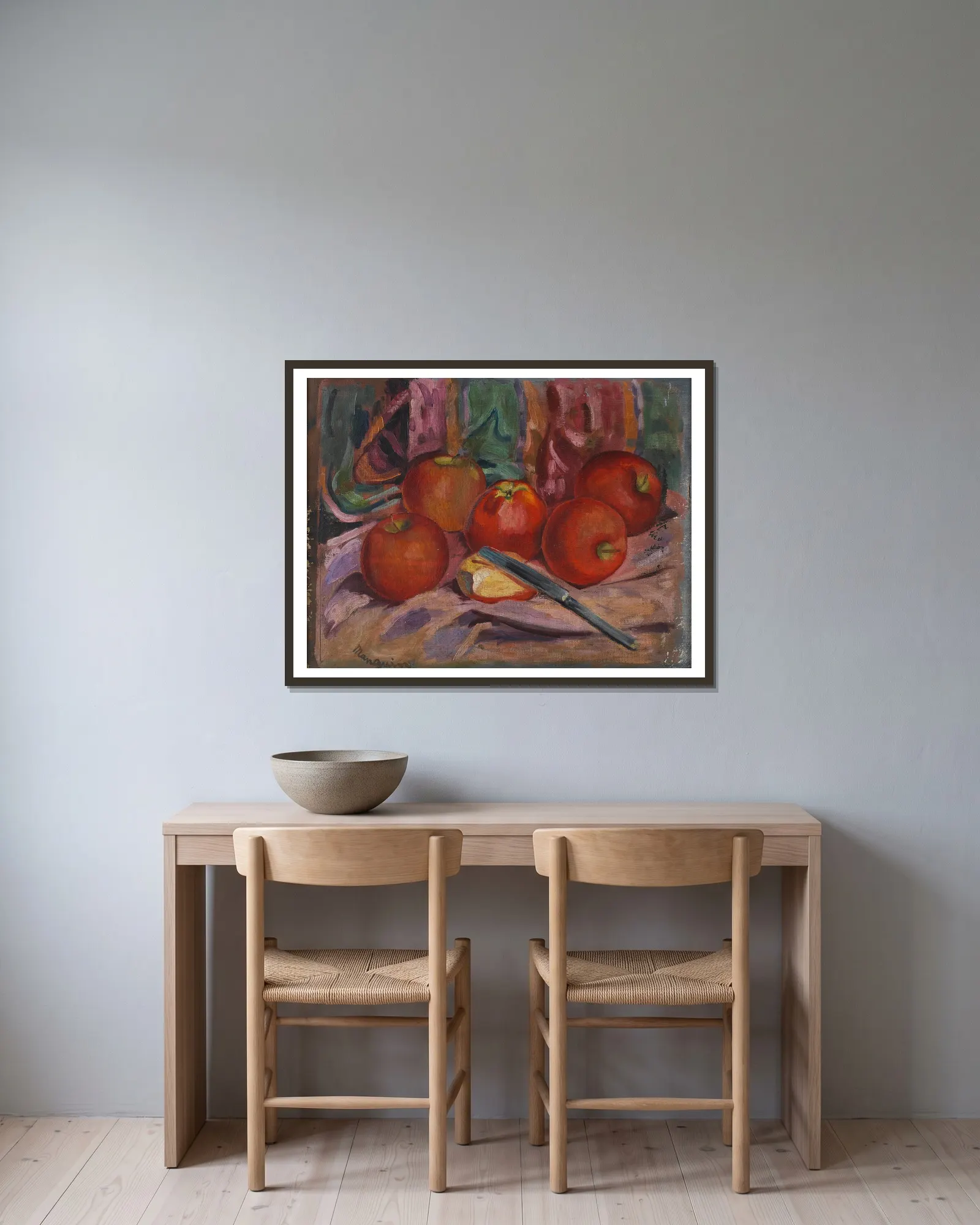 Apples av Henri Manguin inramad på en vägg
