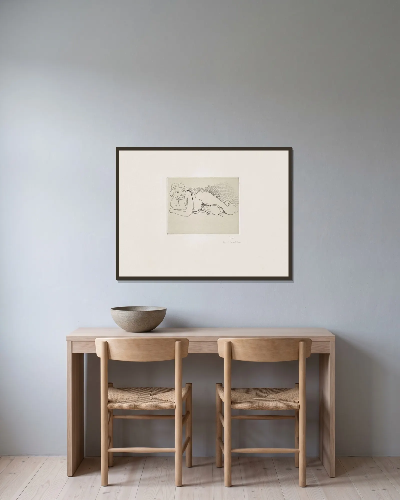 Nu couché av Henri Matisse inramad på en vägg