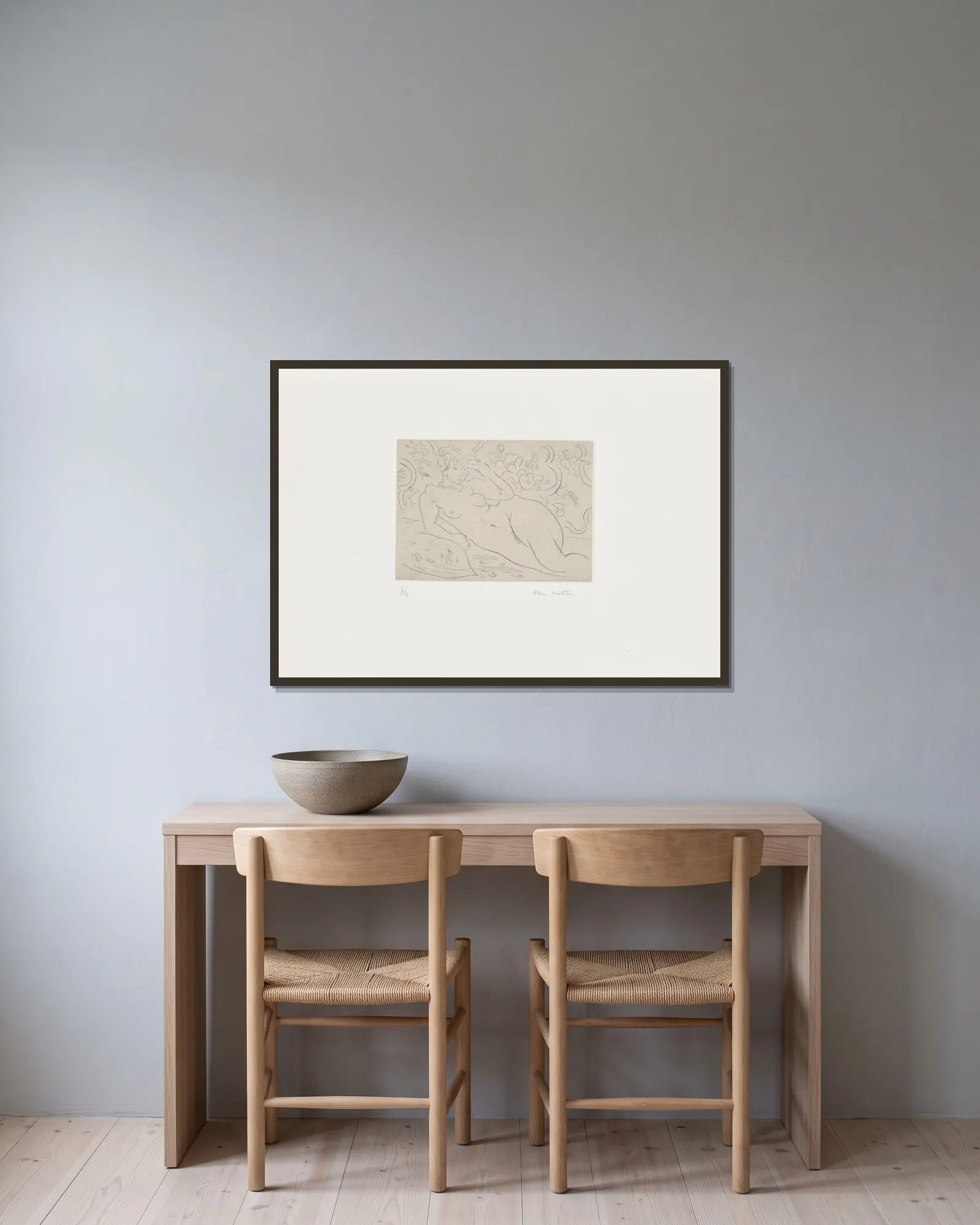 Nu, intérieur fleuri av Henri Matisse inramad på en vägg