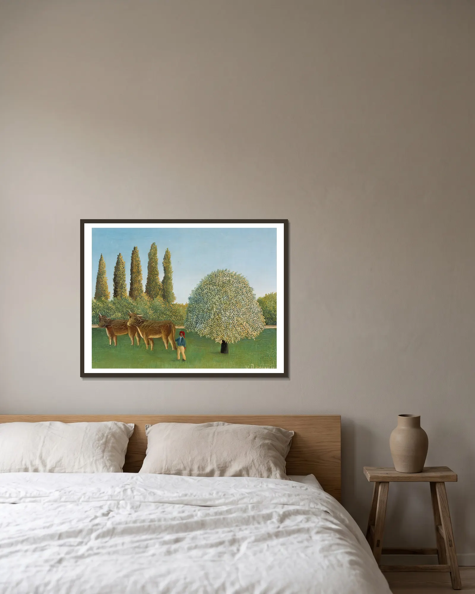 Meadowland (The Pasture) av Henri Rousseau inramad på en vägg