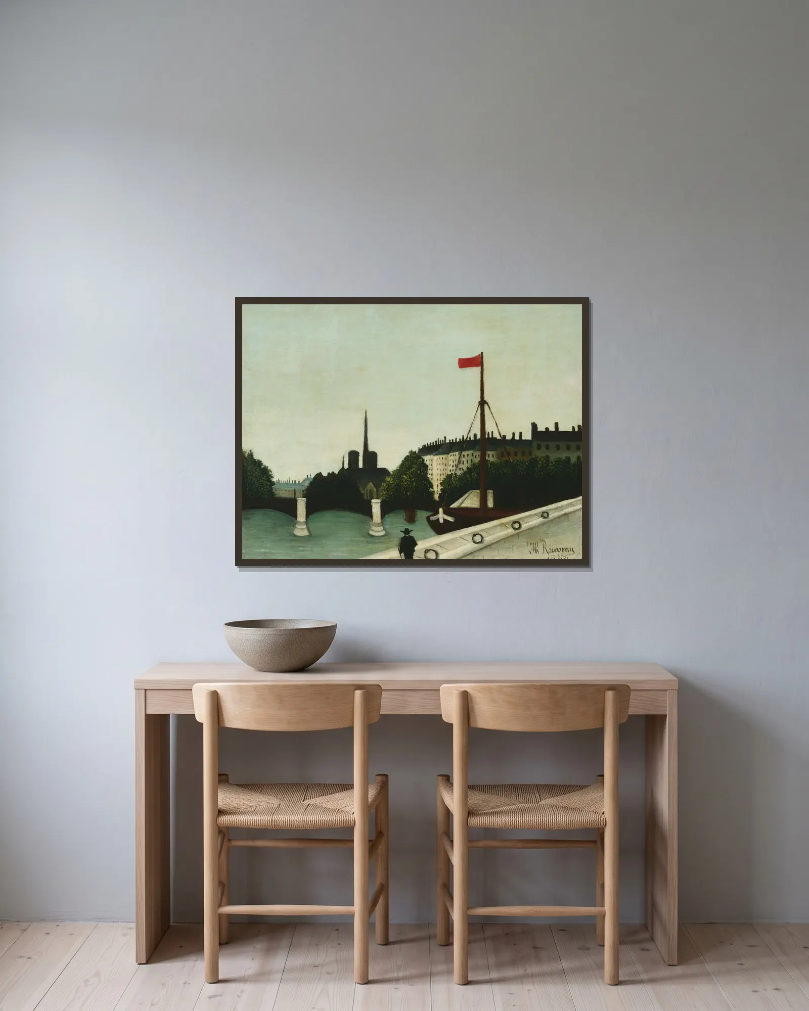 Notre Dame av Henri Rousseau inramad på en vägg