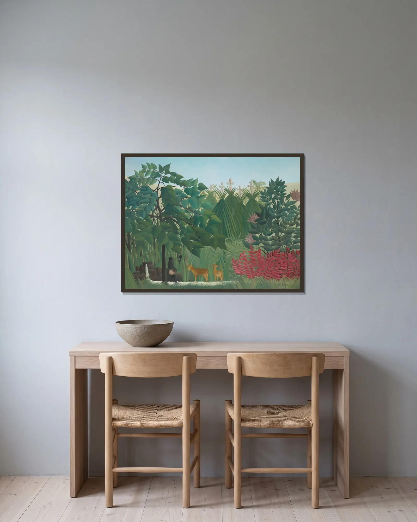 The Waterfall av Henri Rousseau inramad på en vägg