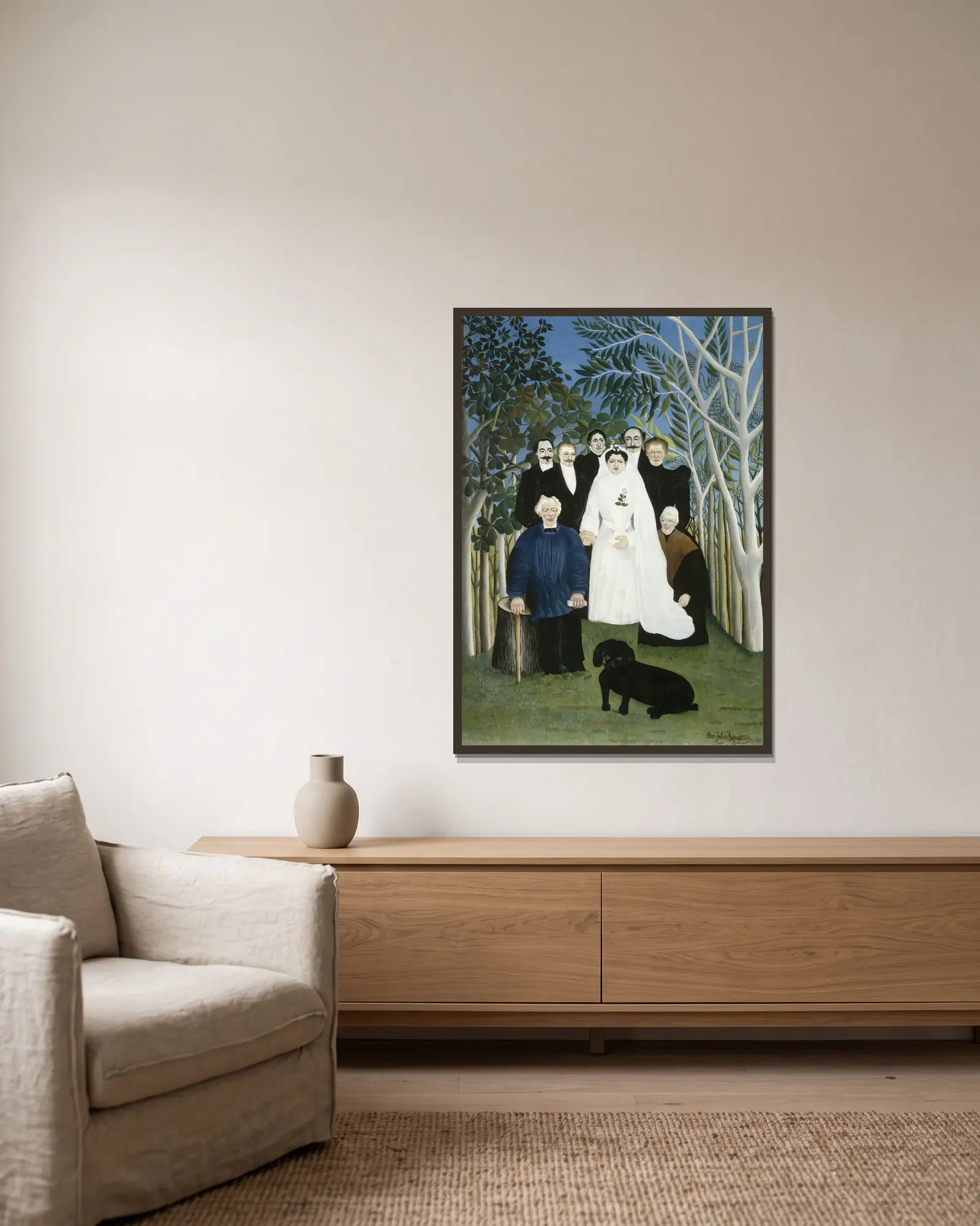 The Wedding Party av Henri Rousseau inramad på en vägg
