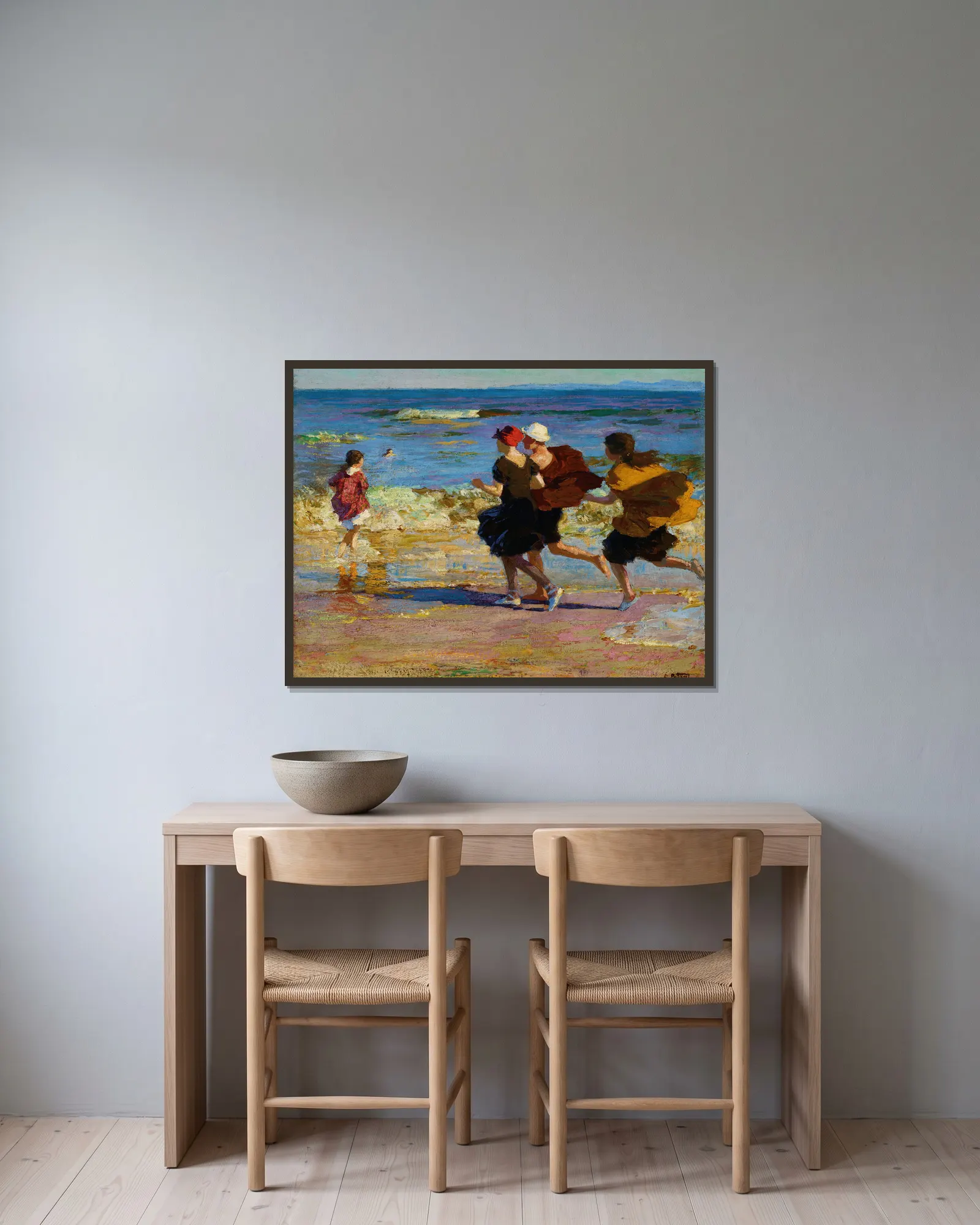 On the Beach av Edward Henry Potthast inramad på en vägg
