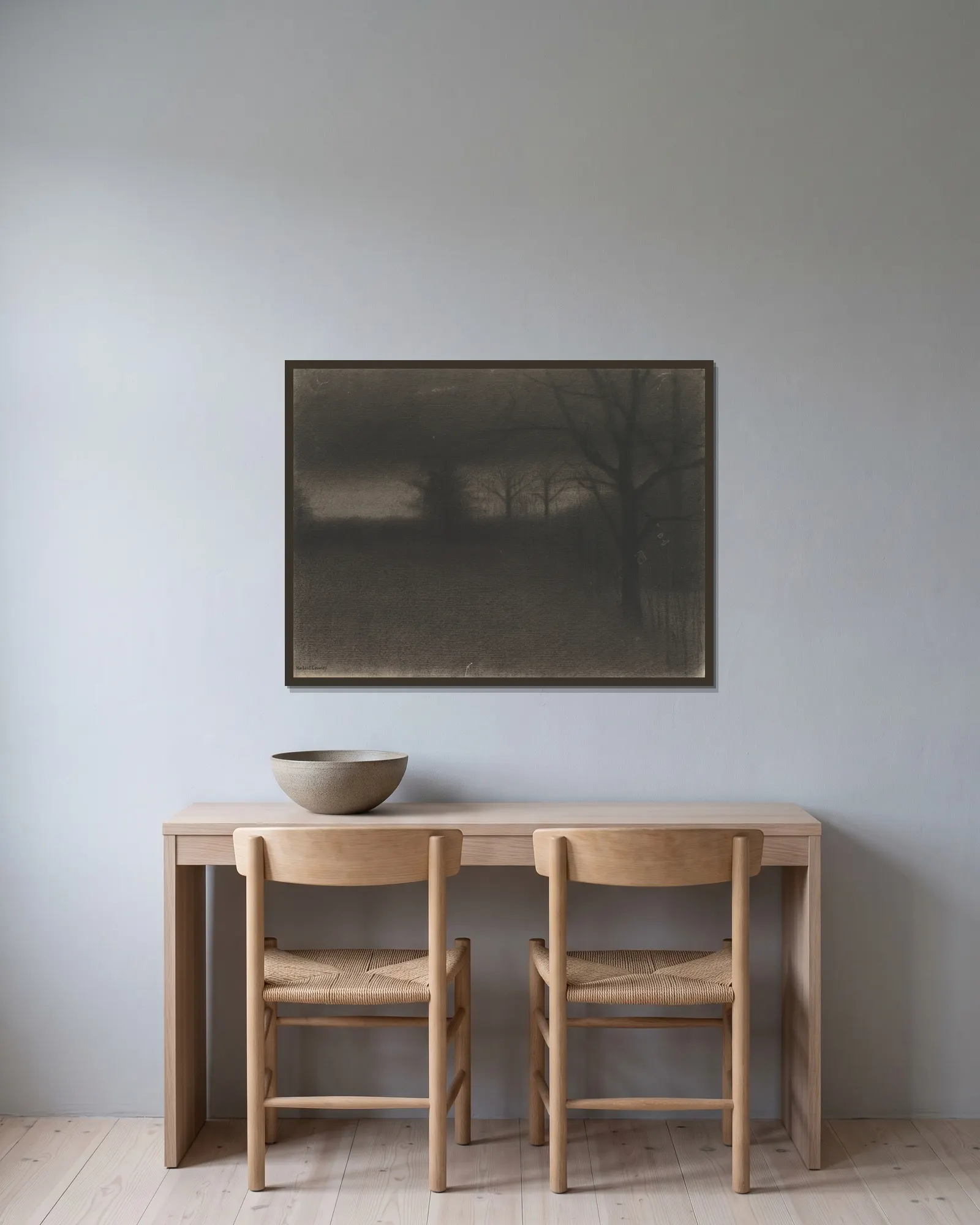 A Dark Landscape av Herbert Crowley inramad på en vägg