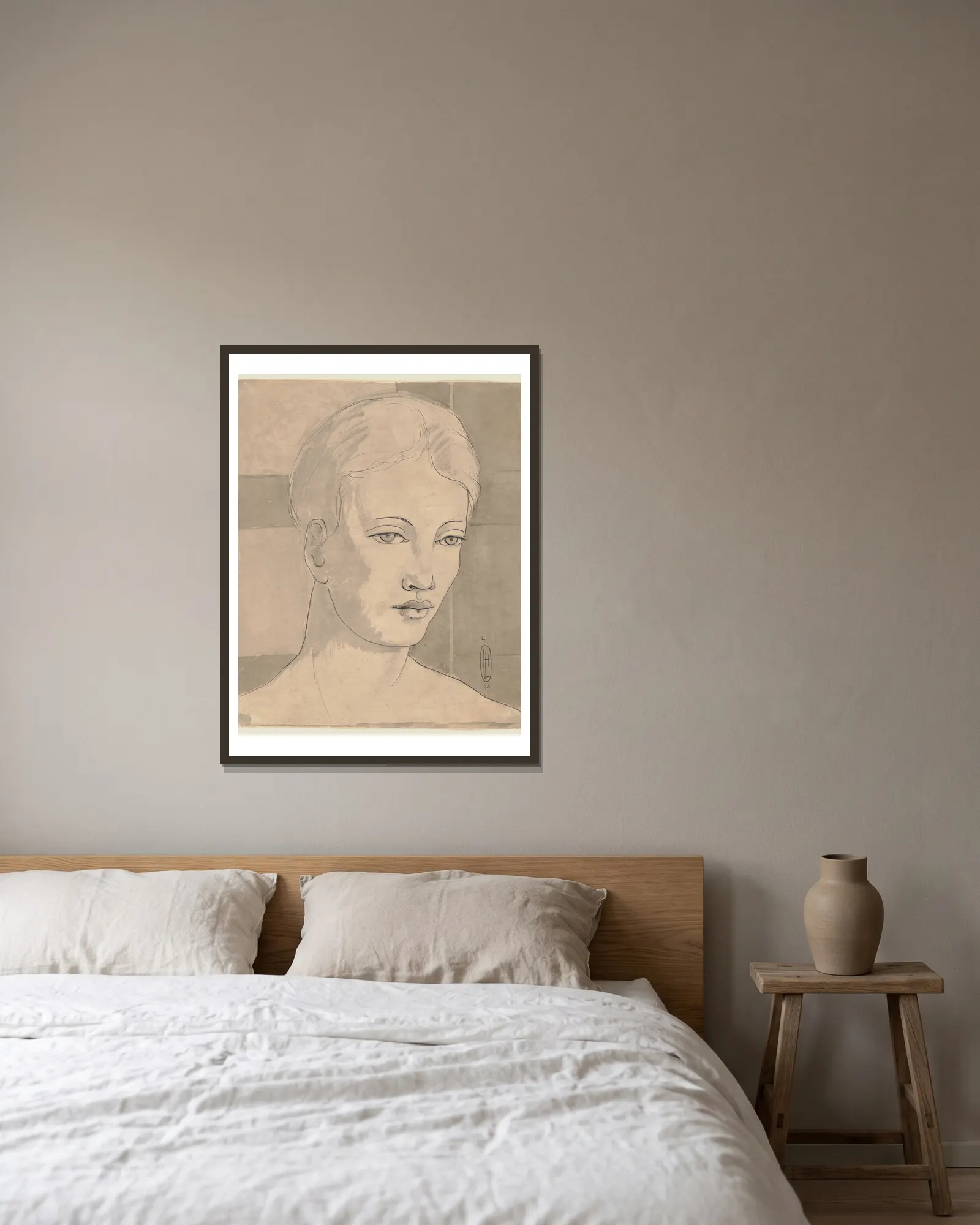 Female portrait av Hermann Lismann inramad på en vägg