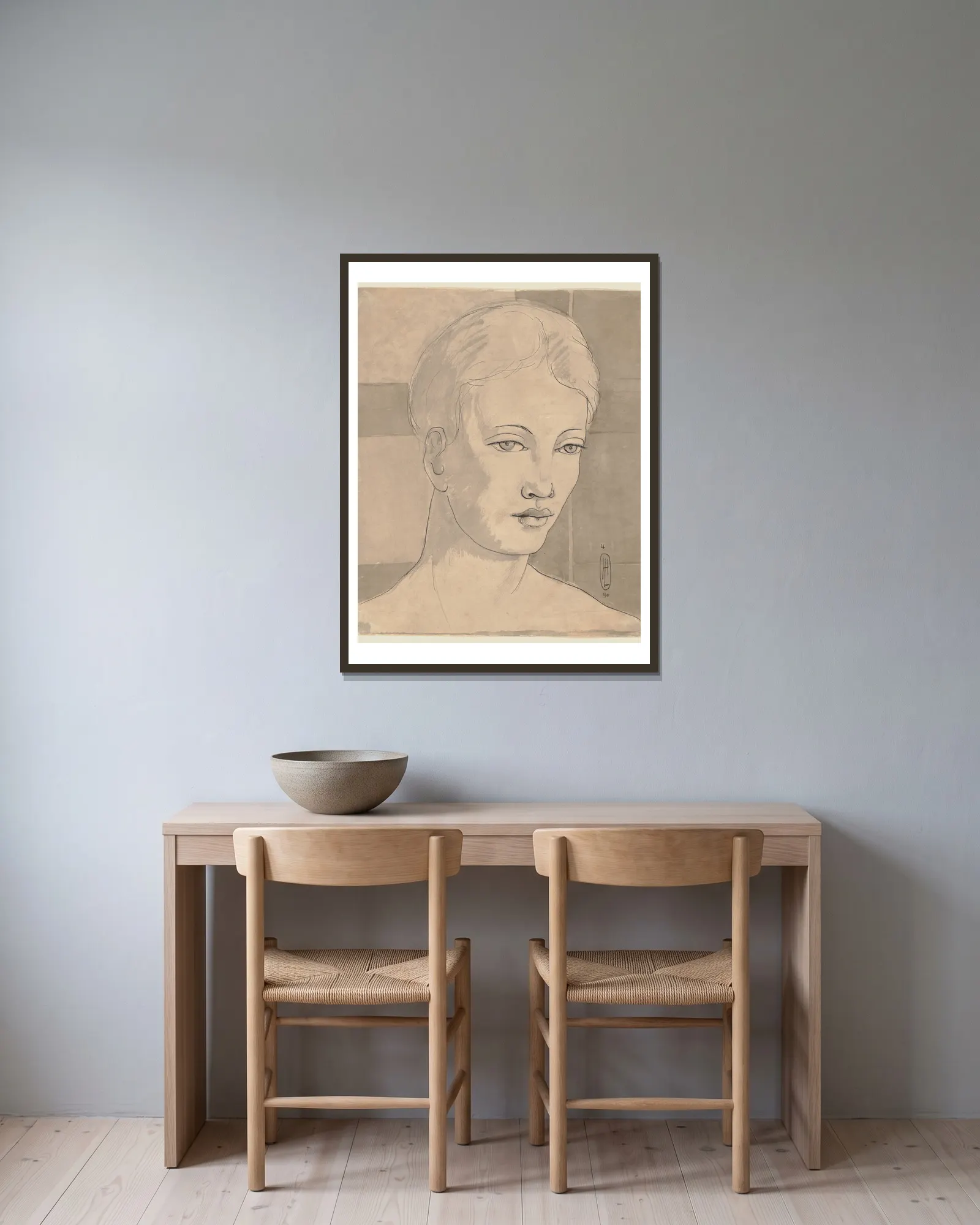 Female portrait av Hermann Lismann inramad på en vägg