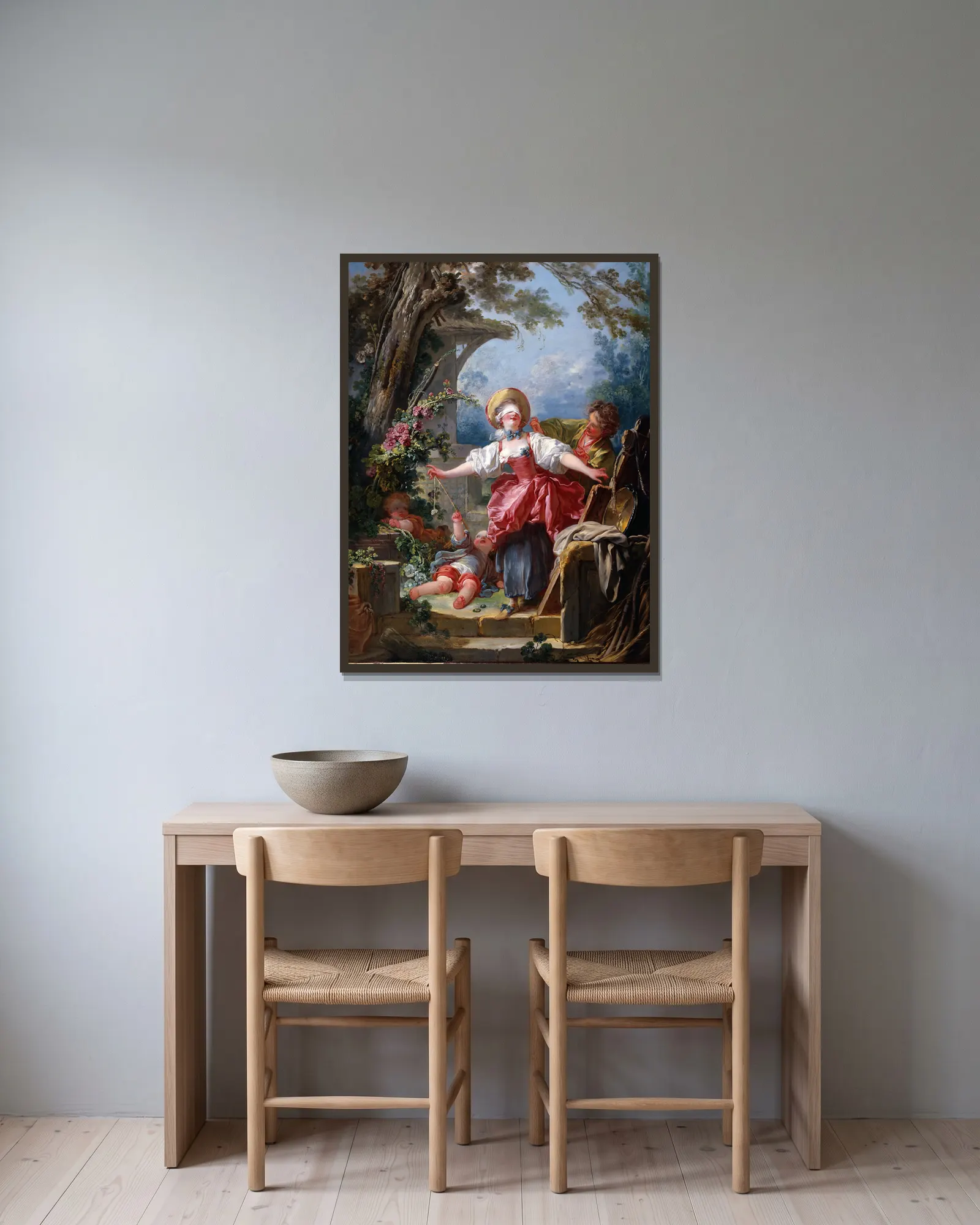 Blind-Man’s Buff av Jean-Honoré Fragonard inramad på en vägg