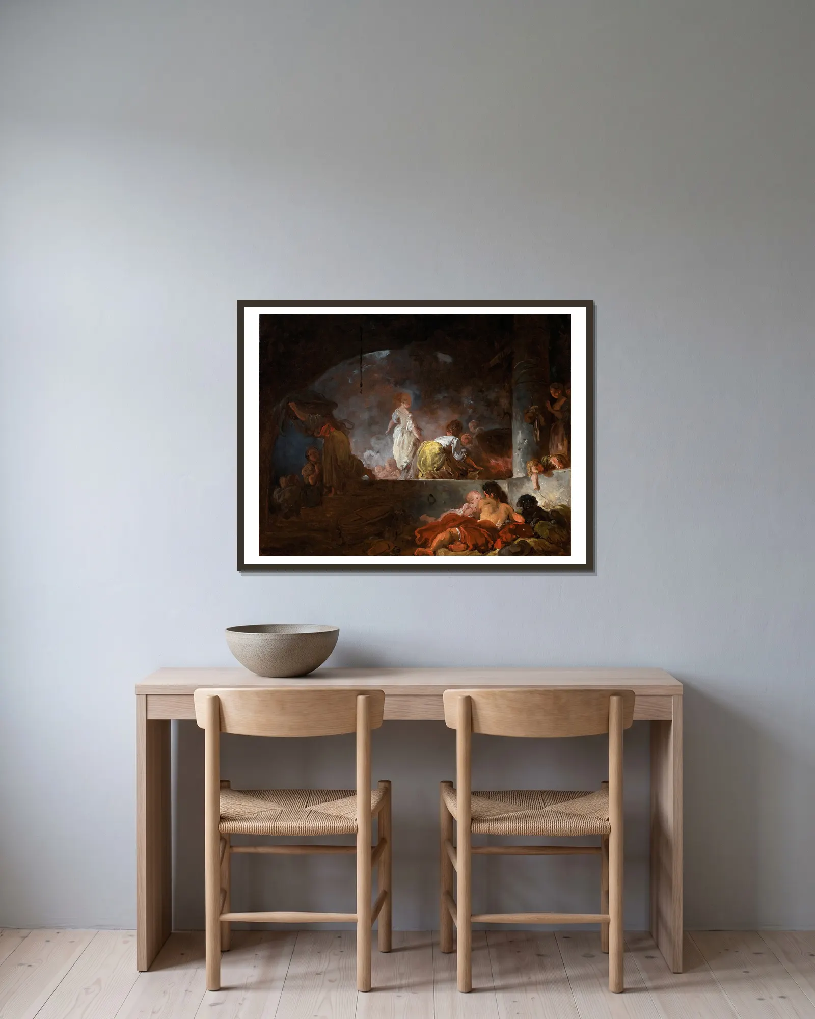 The Laundresses av Jean-Honoré Fragonard inramad på en vägg