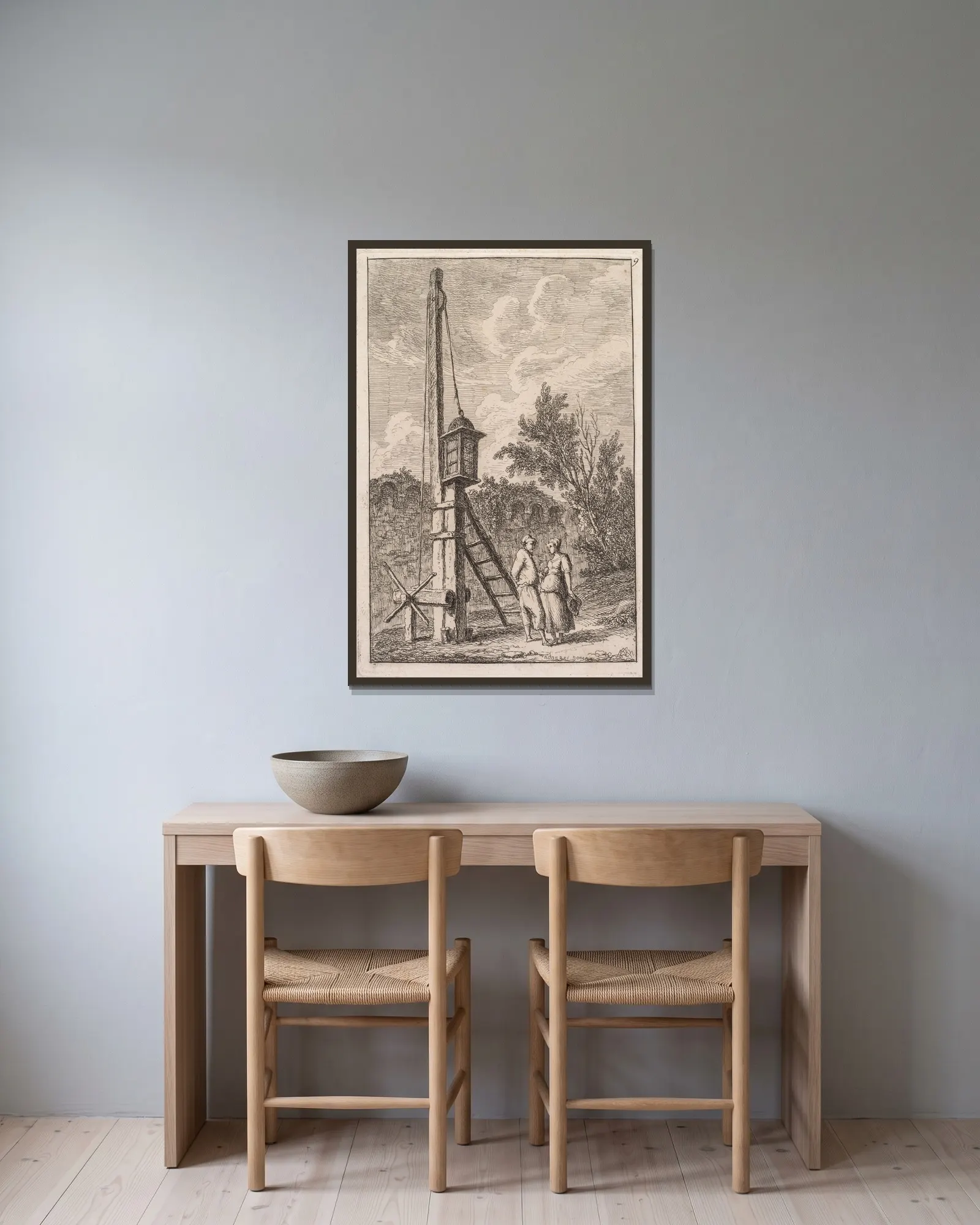 Le Poteau av Hubert Robert inramad på en vägg