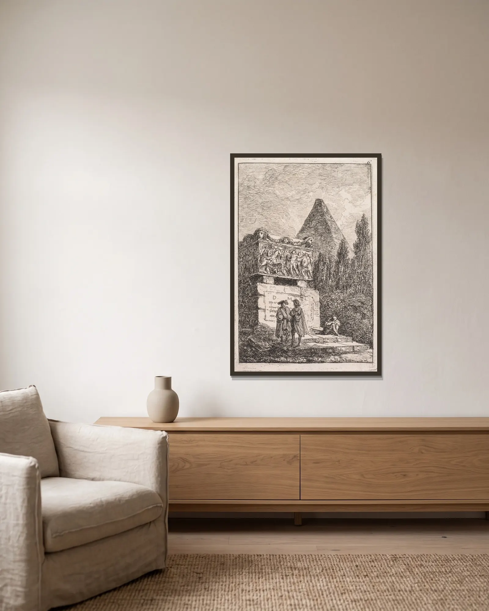 Le Sarcophage av Hubert Robert inramad på en vägg