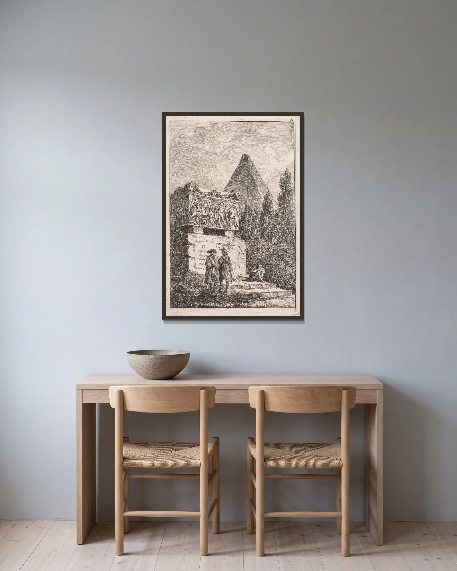 Le Sarcophage av Hubert Robert inramad på en vägg