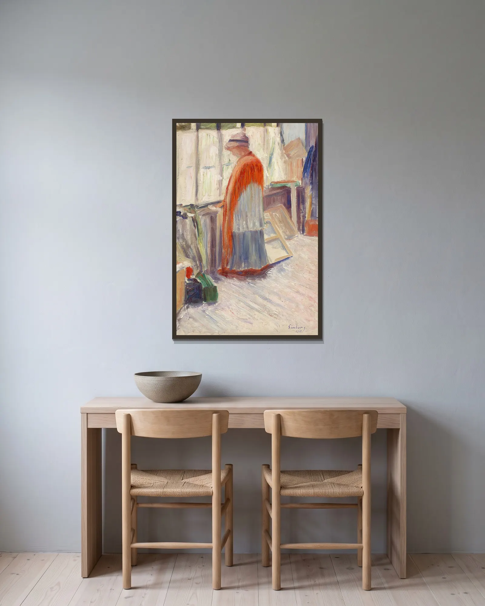 In The Studio av Hugo Simberg inramad på en vägg