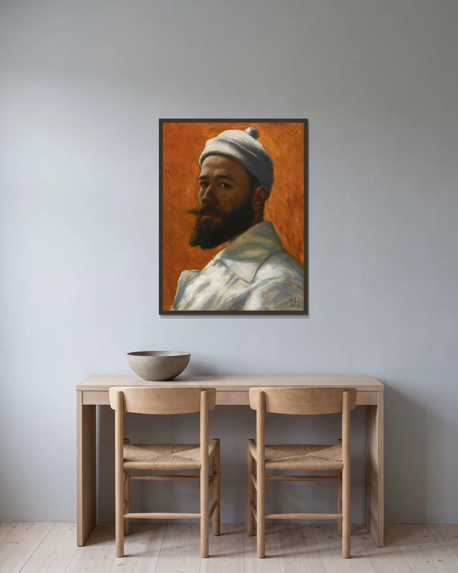 Self-Portrait av Hugo Simberg inramad på en vägg