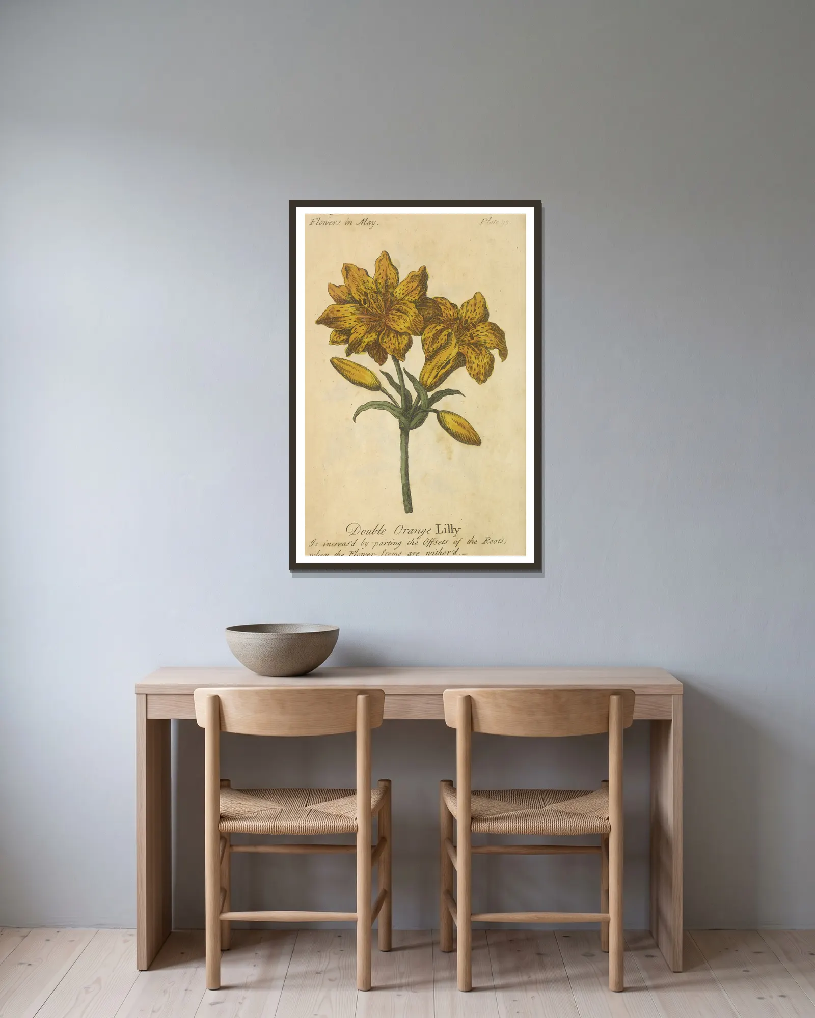 Double Orange Lily av J. Duke inramad på en vägg