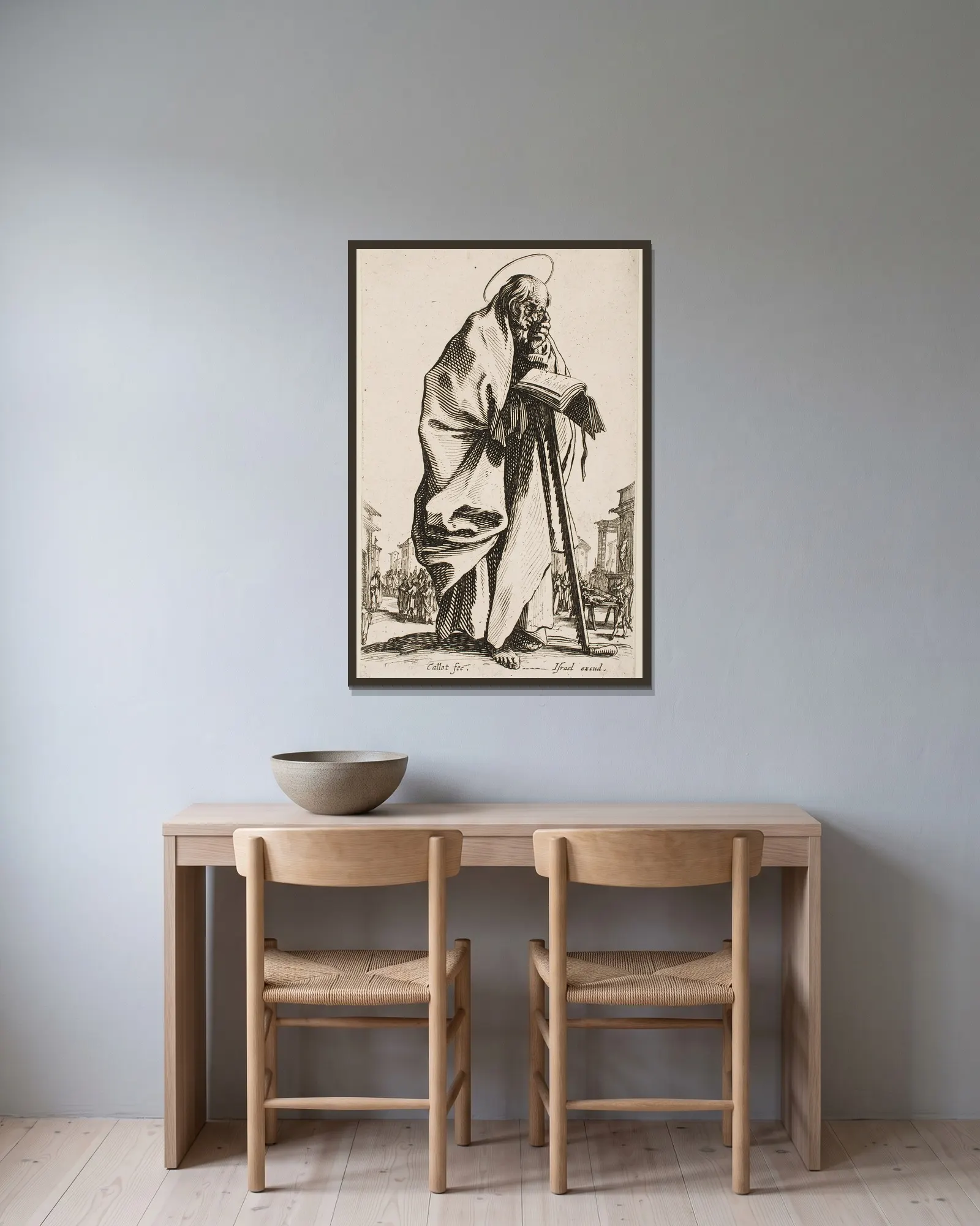 St. Simon av Jacques Callot inramad på en vägg