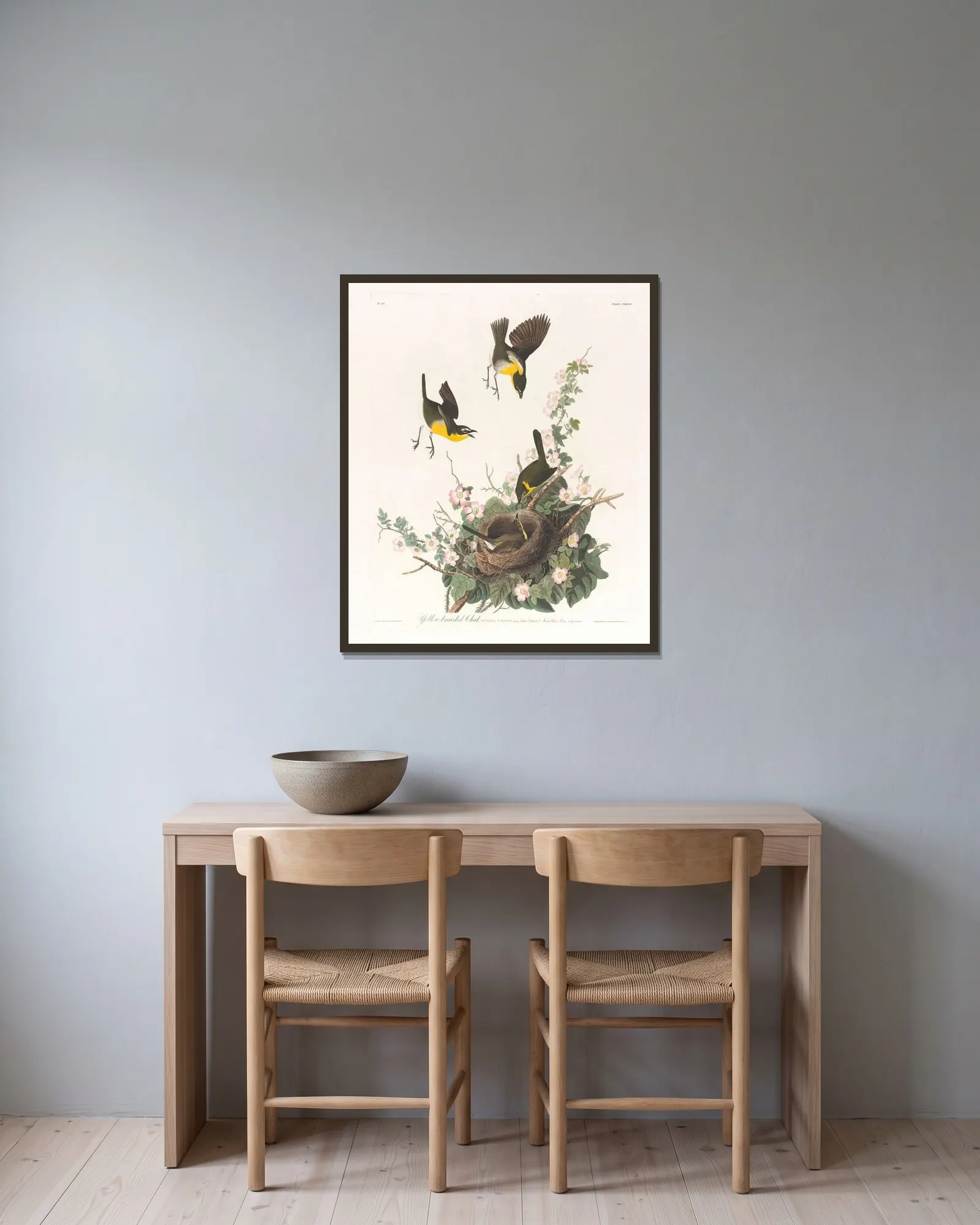 Yellow-breasted chat av John James Audubon inramad på en vägg