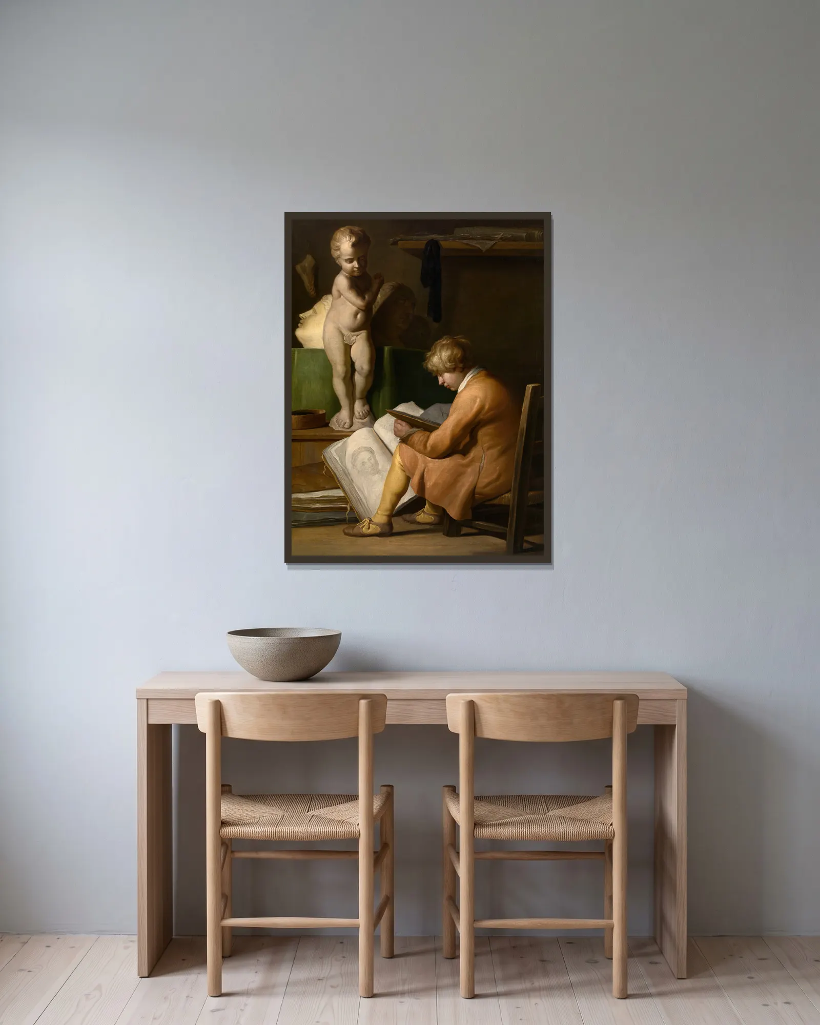 A Young Artist av Jan Lievens inramad på en vägg