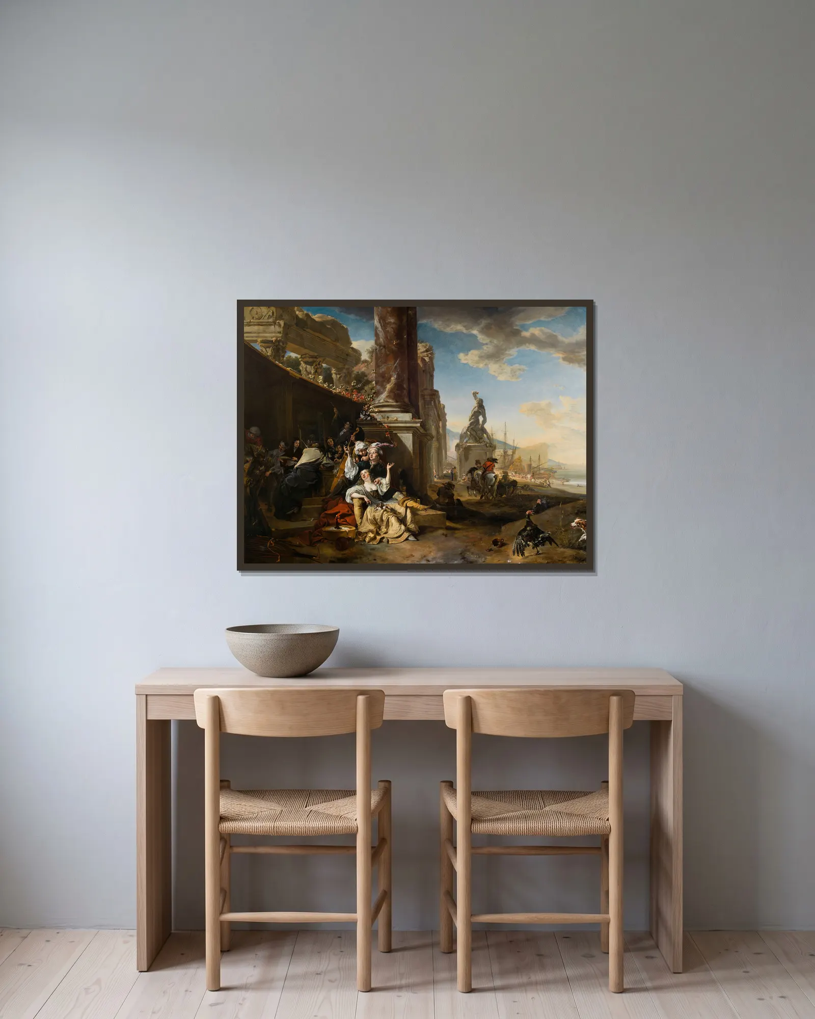 La Partie de plaisir av Jan Weenix inramad på en vägg