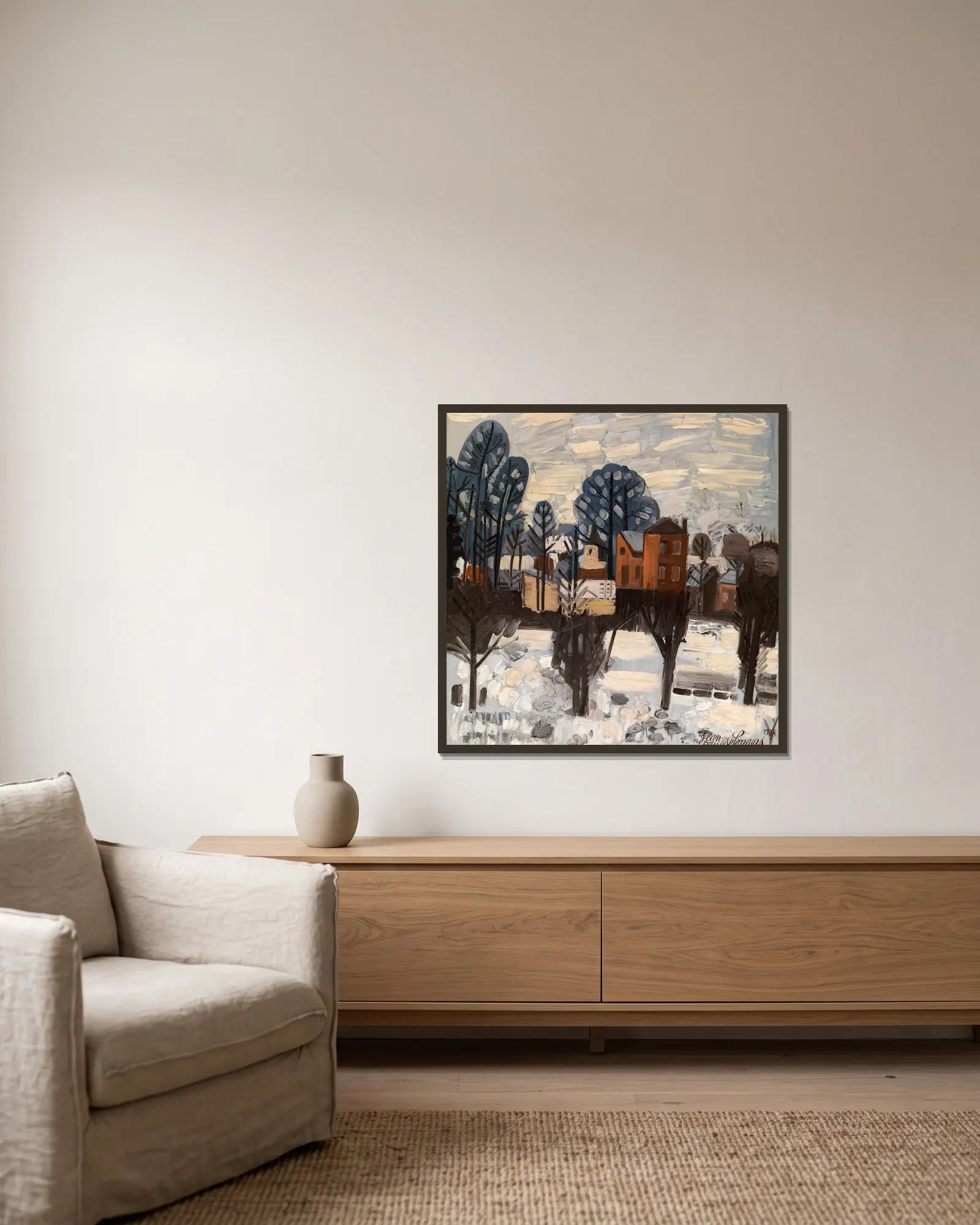 Snowy Landscape av Jean Brusselmans inramad på en vägg