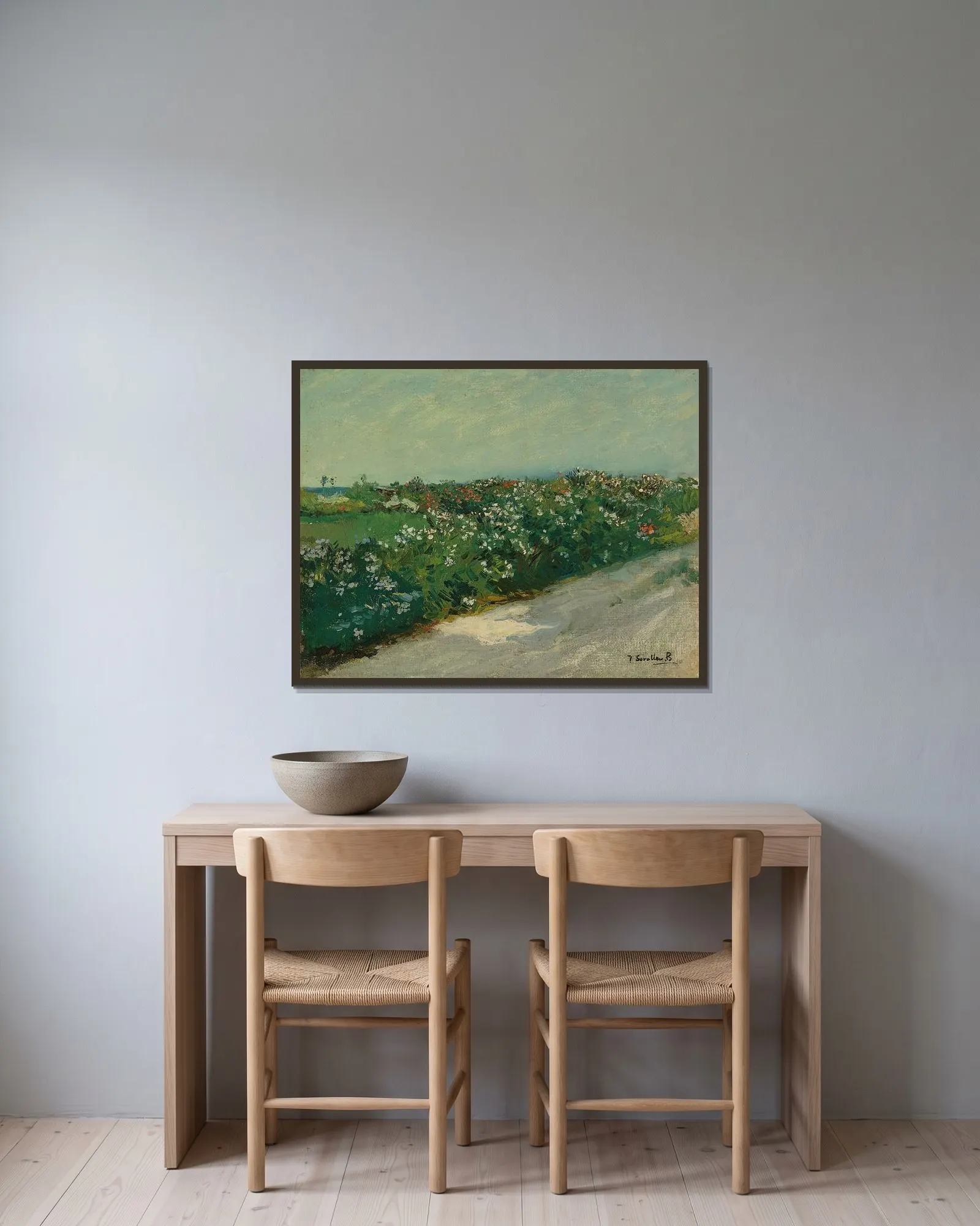Malvarrosa av Joaquín Sorolla inramad på en vägg