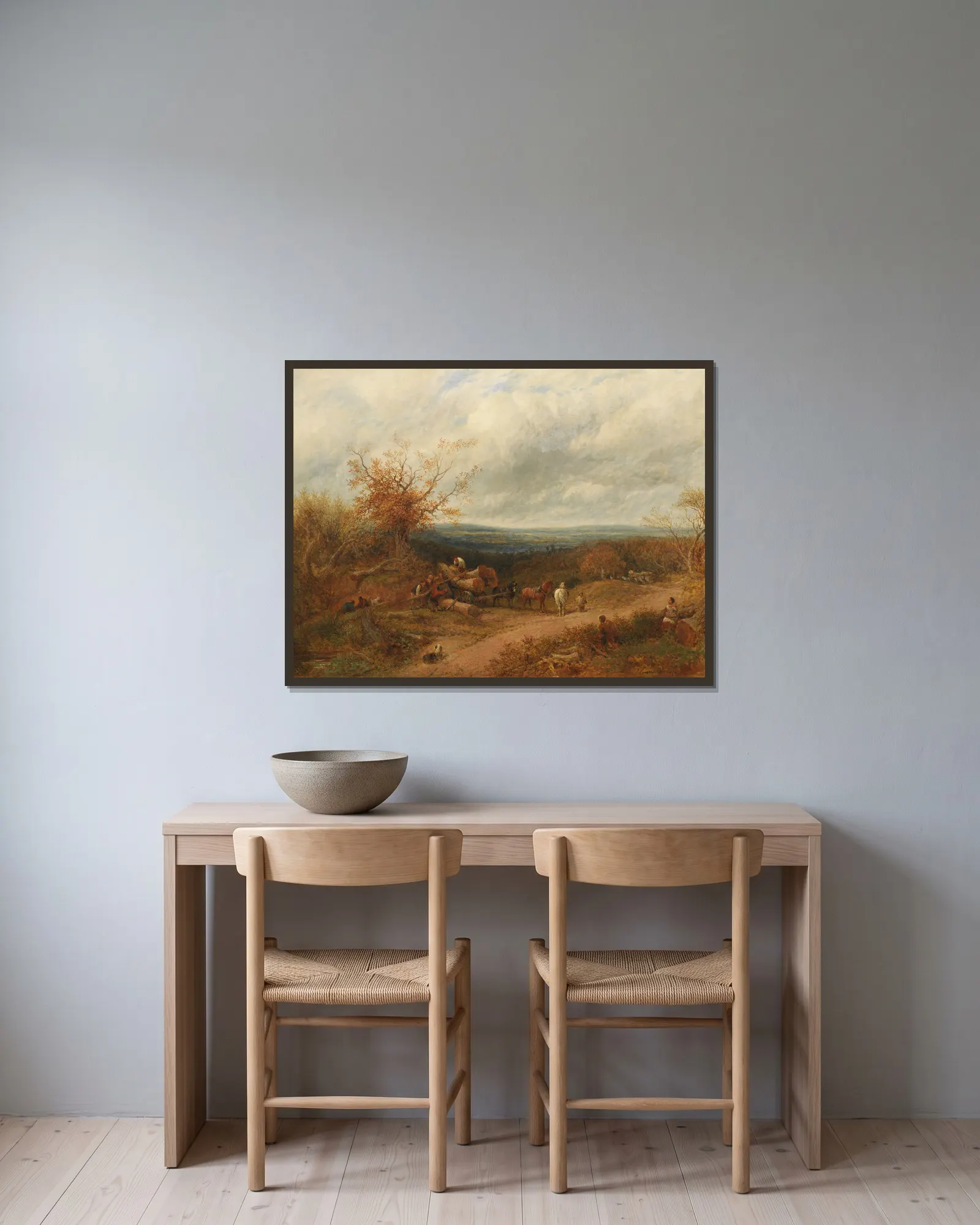Woodcutters av John Linnell inramad på en vägg