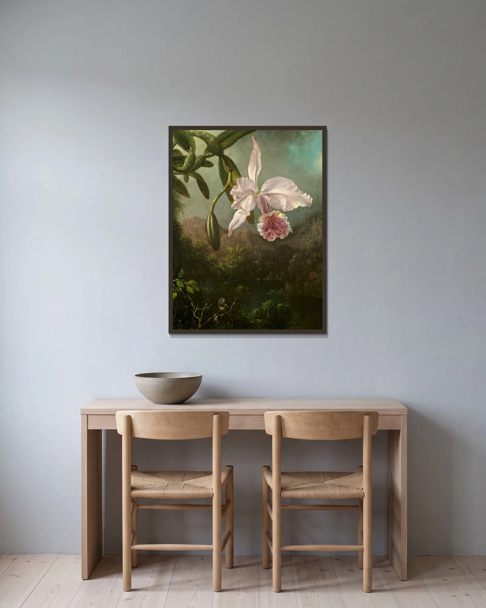 Orchid Blossoms av Martin Johnson Heade inramad på en vägg