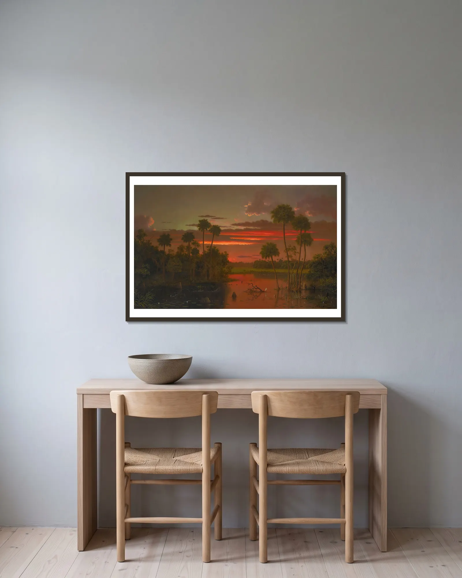 The Great Florida Sunset av Martin Johnson Heade inramad på en vägg
