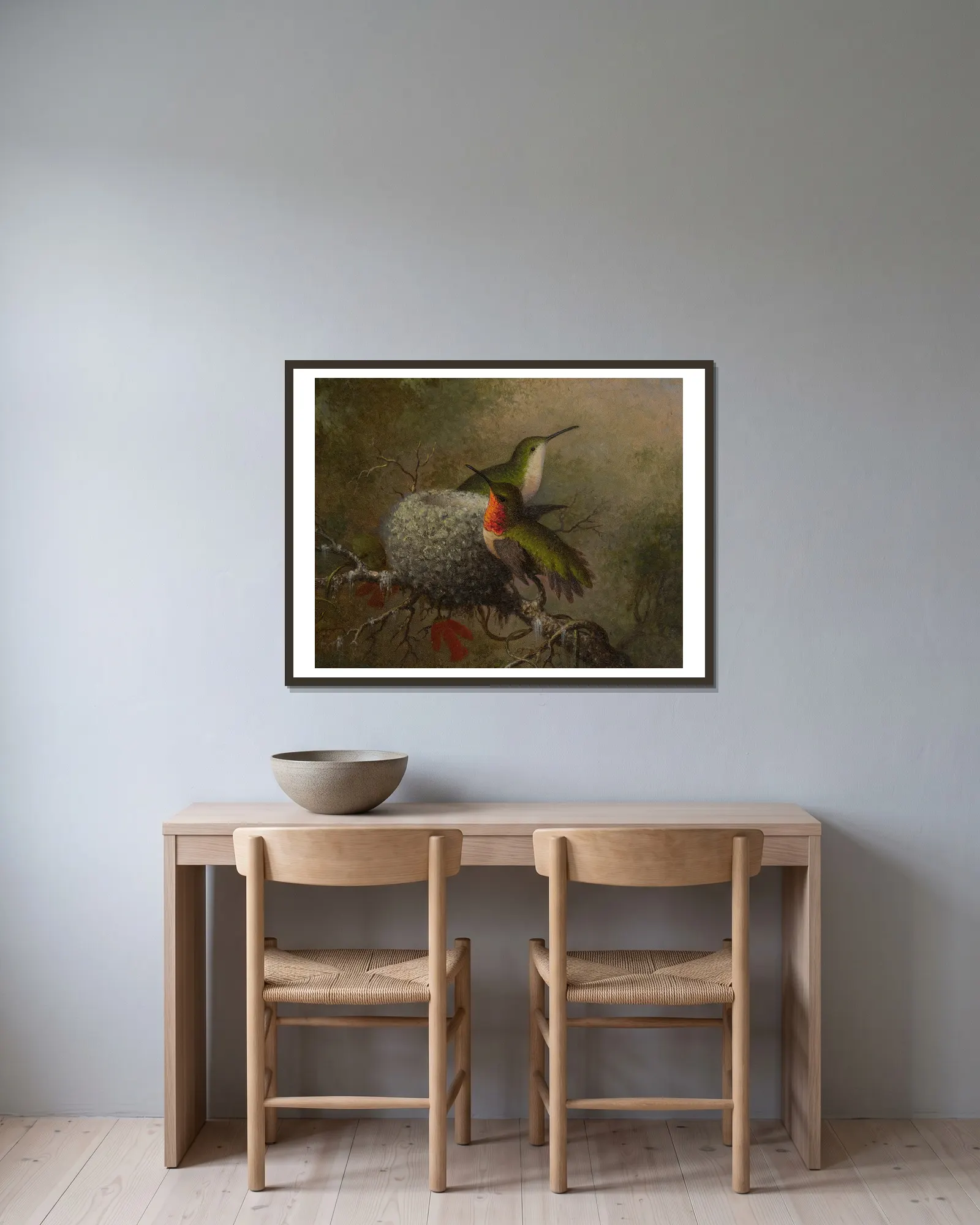 Two Ruby Throats By Their Nest av Martin Johnson Heade inramad på en vägg