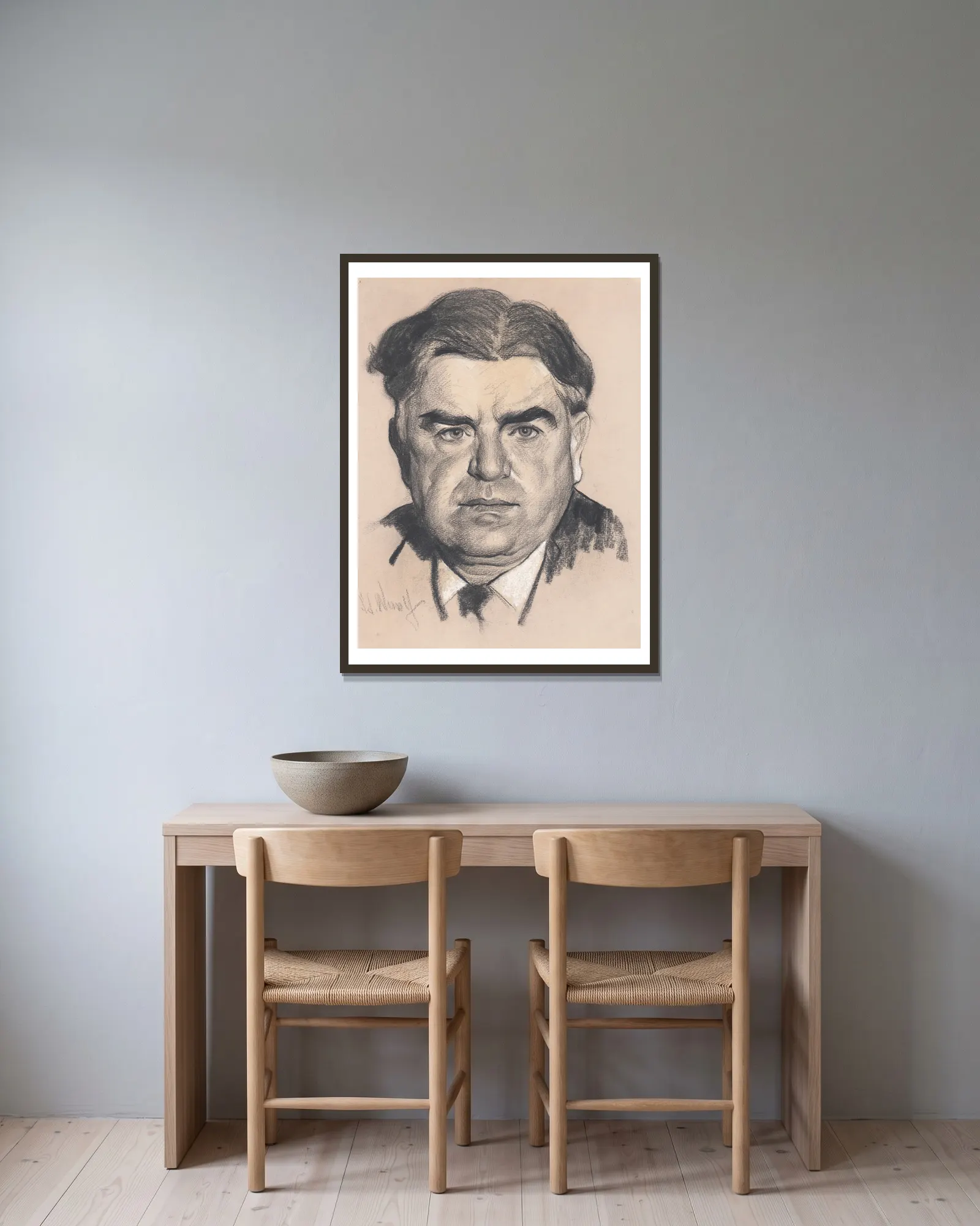 John Llewellyn Lewis av Samuel Johnson Woolf inramad på en vägg