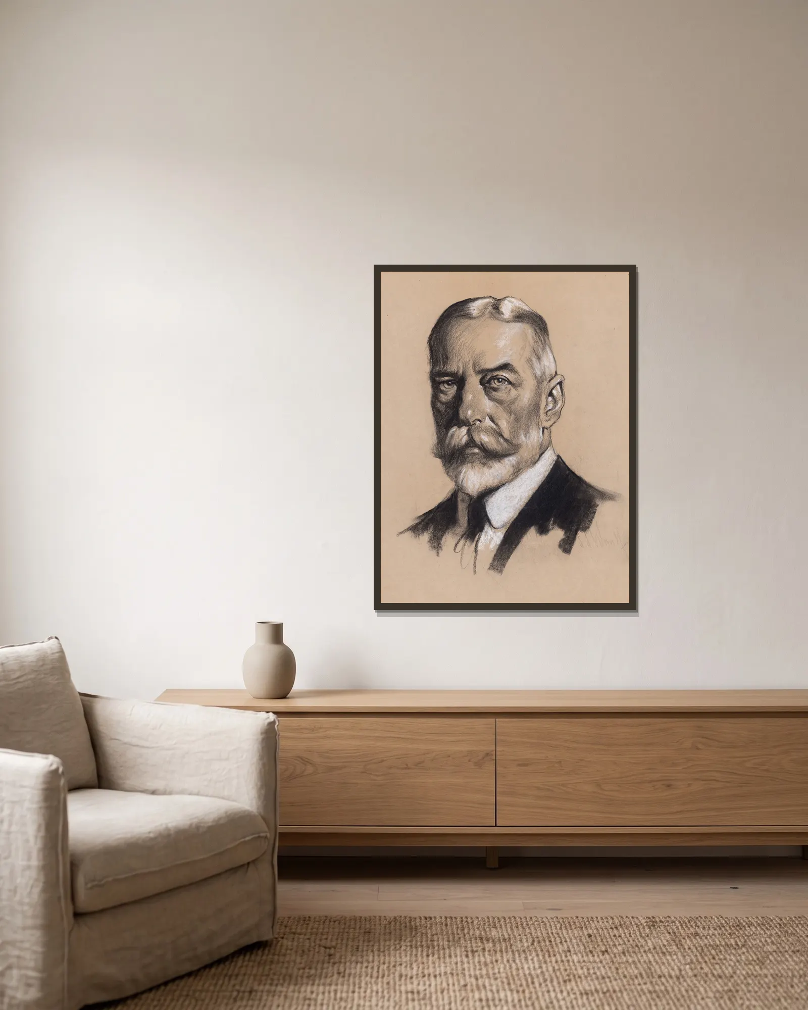 King George V av Samuel Johnson Woolf inramad på en vägg