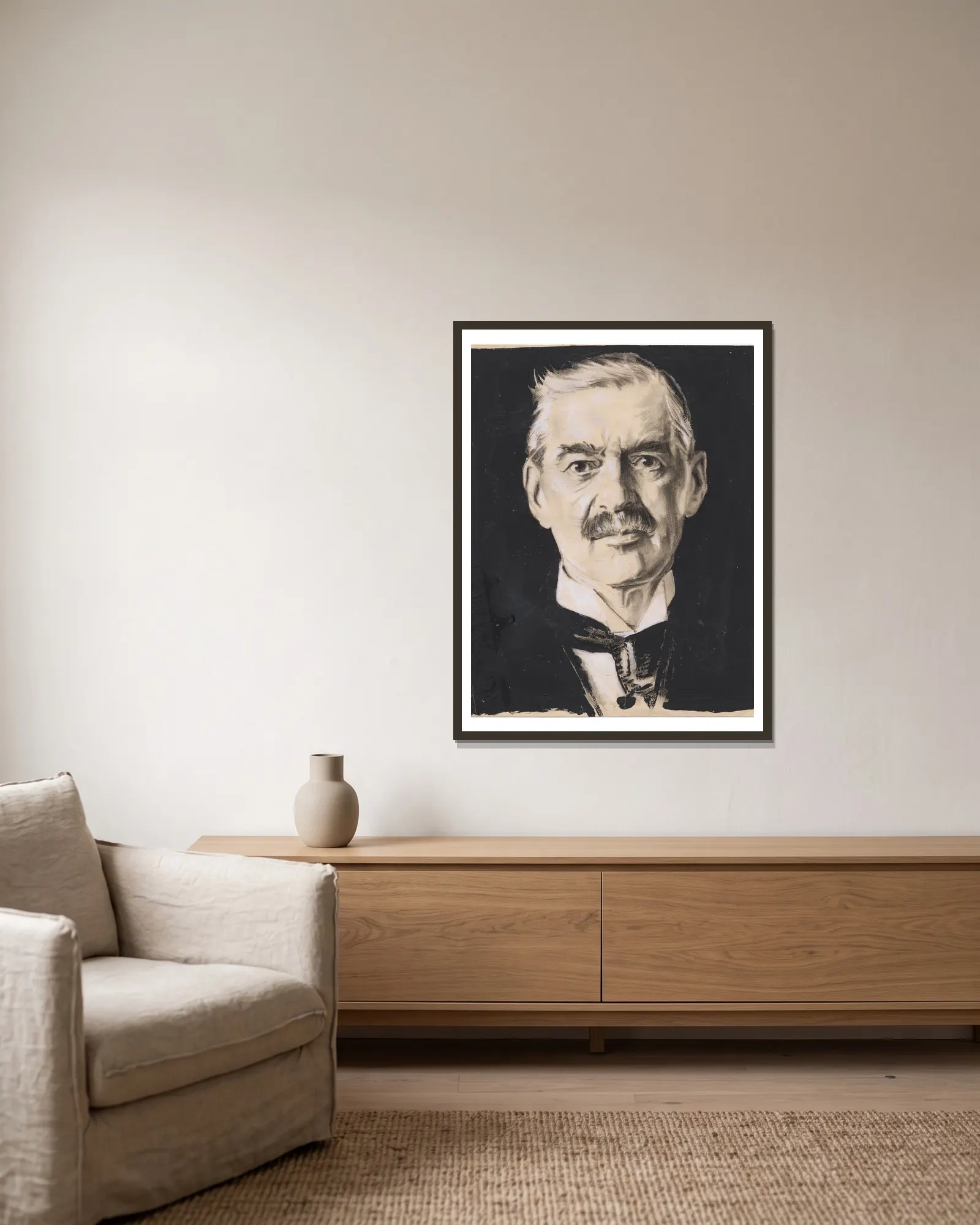 Neville Chamberlain av Samuel Johnson Woolf inramad på en vägg