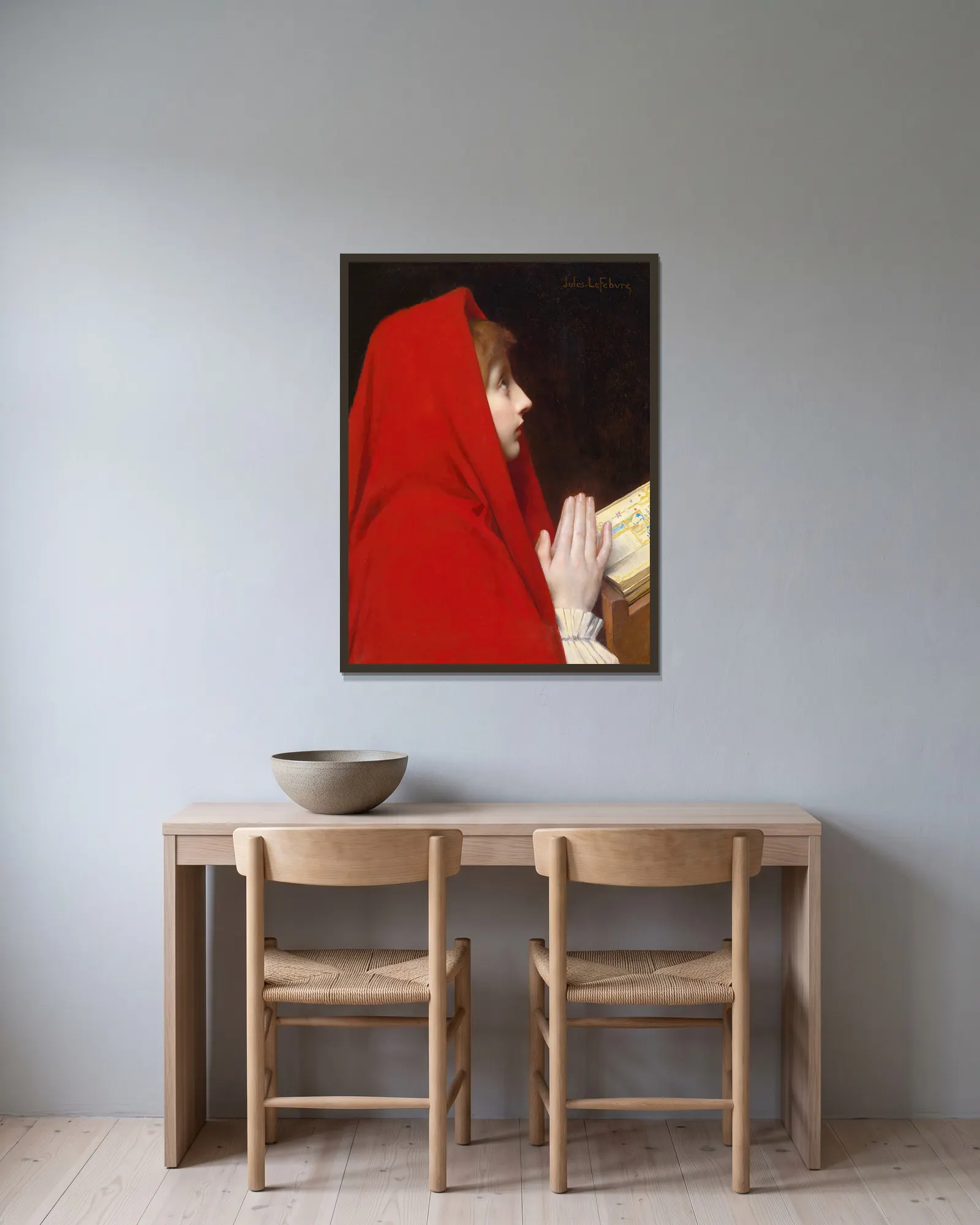 The Red Cloak av Jules Joseph Lefebvre inramad på en vägg